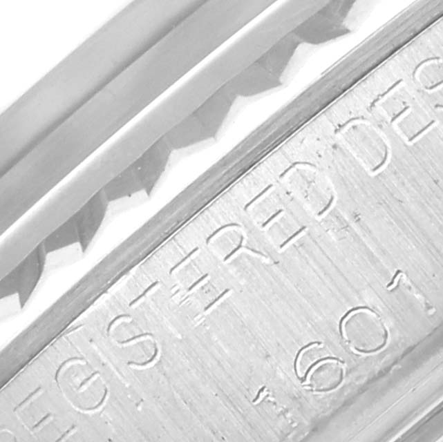 Close-up of the side case and bezel of a Vintage Collection model by Rolex.