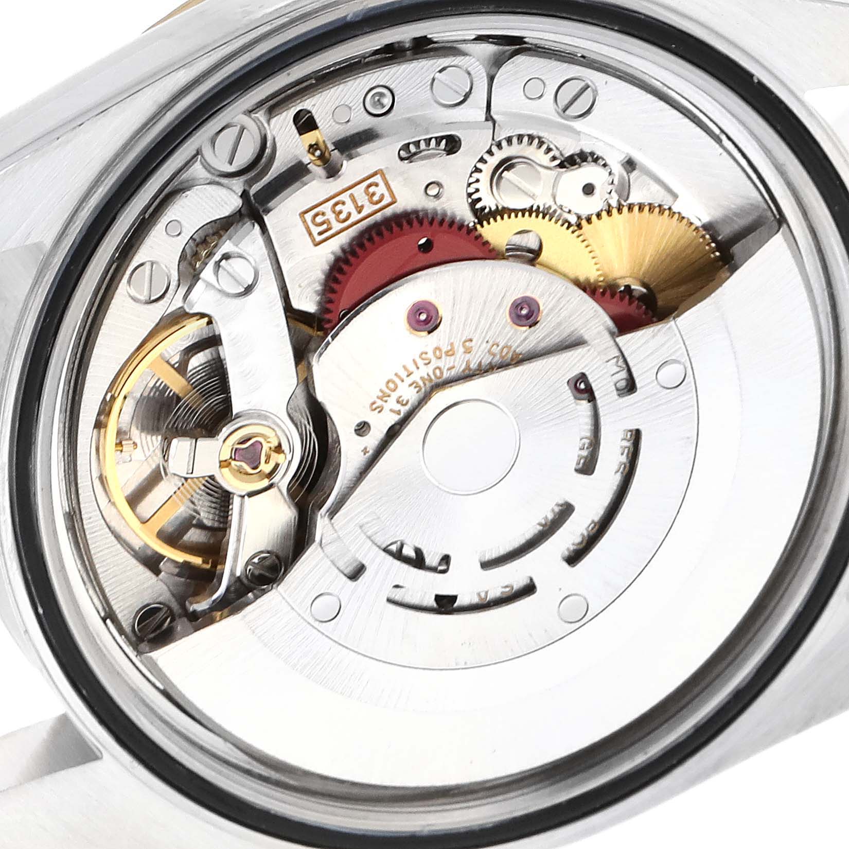 The image shows the movement mechanism of a Rolex Datejust, model 16233, viewed from the back, highlighting gears and components within the case.