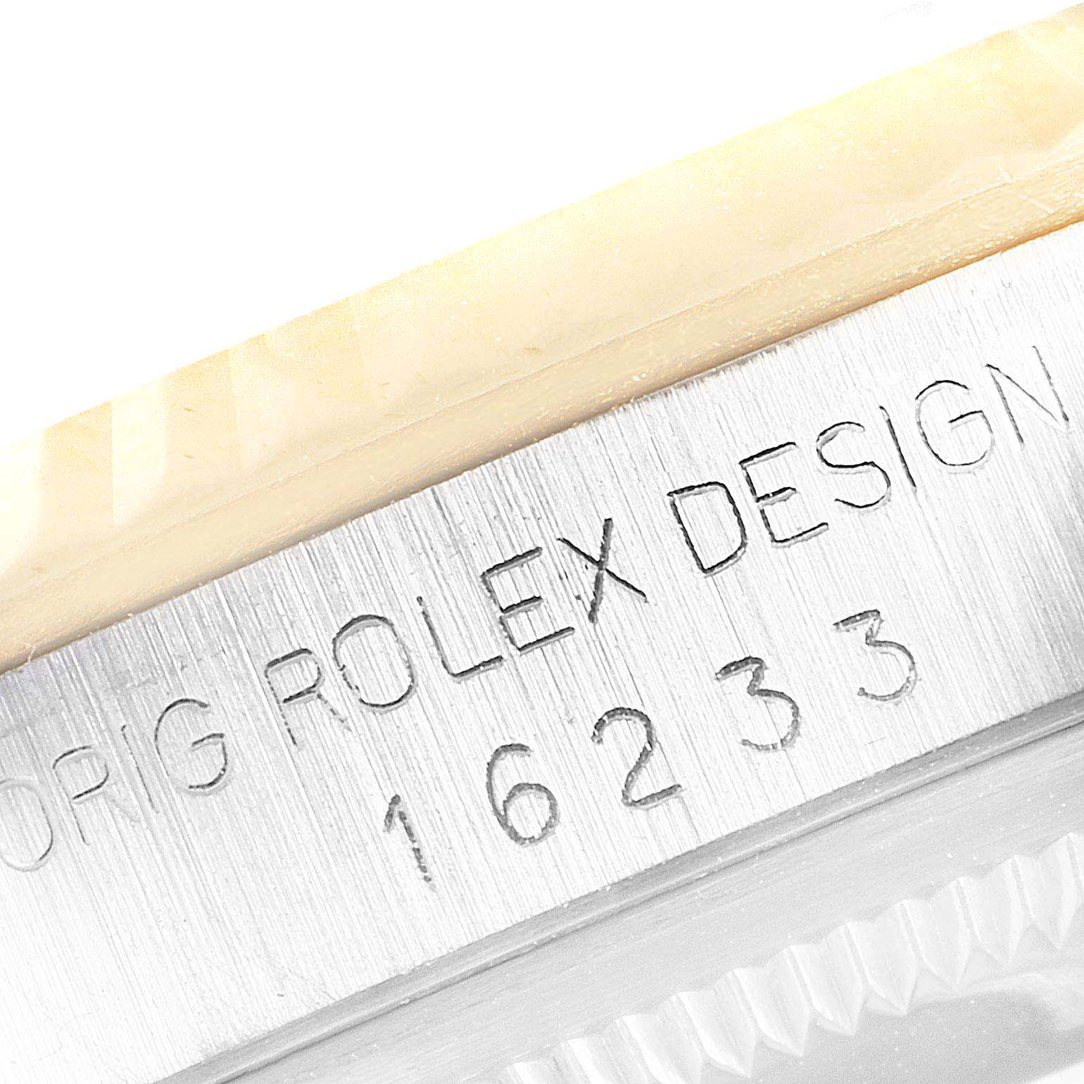 The image shows a close-up of the side of a Rolex Datejust, model number 16233, focusing on the engraved "ORIG ROLEX DESIGN 16233" on the case side.