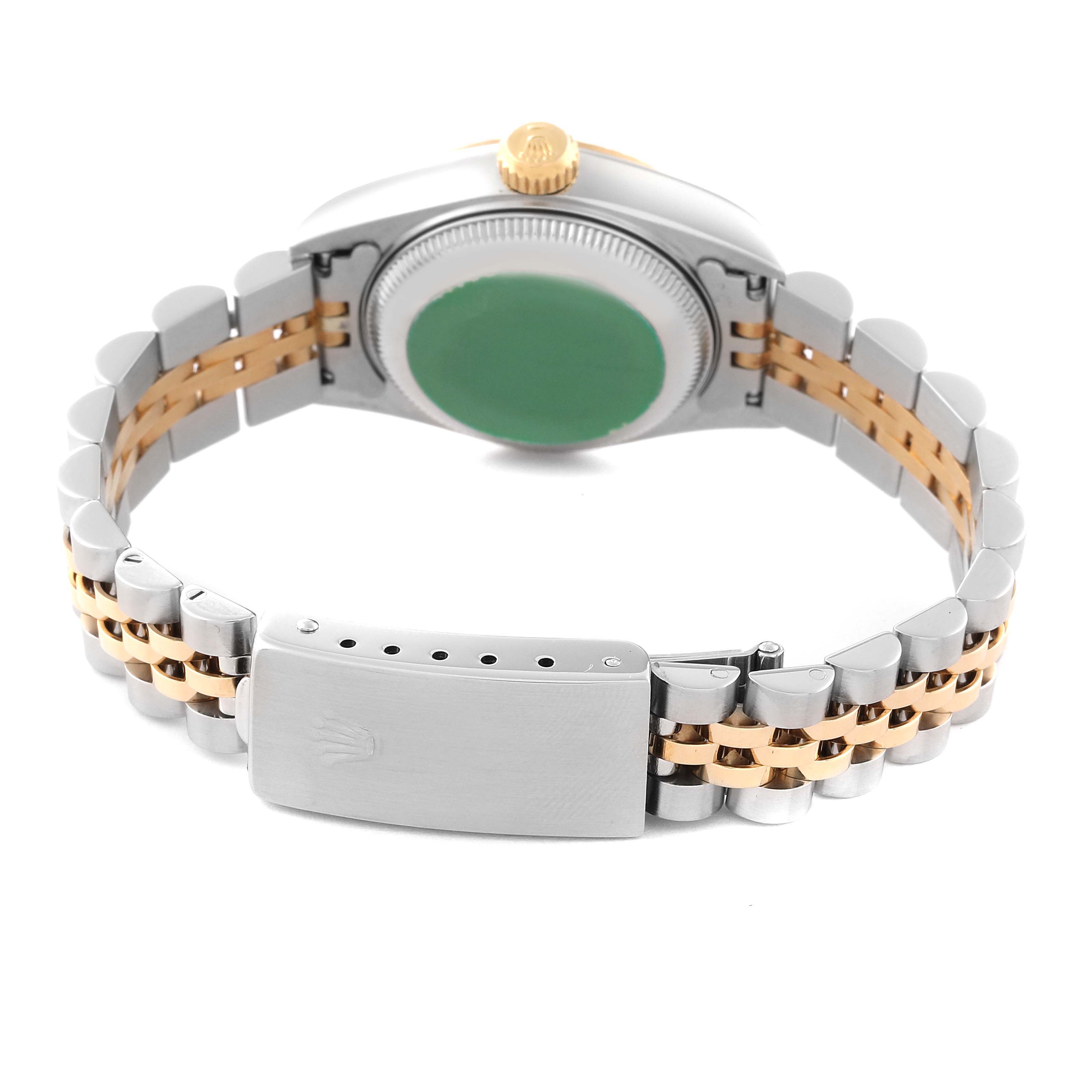 The image shows the back of a Rolex Datejust 69173 Women's Steel and Gold (two tone) Champagne Dial 69173 Women's Steel and Gold (two tone) Champagne Dial watch, including its case back, gold crown, and two-tone bracelet with a clasp.
