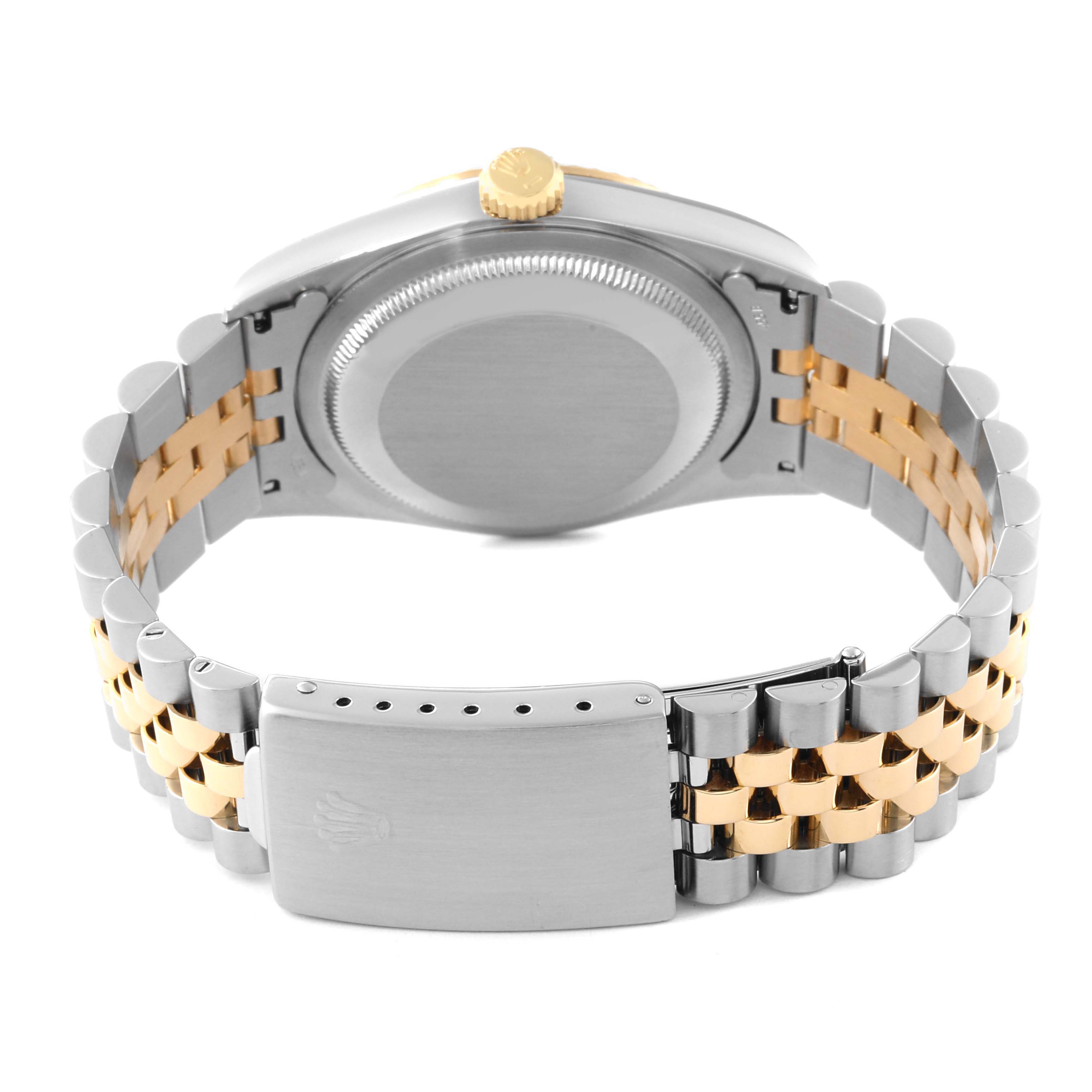 The back view of a Rolex Datejust 16233 Men
s Steel and Gold (two tone) Grey Dial 16233 Men
s Steel and Gold (two tone) Grey Dial watch, showing the two-tone bracelet, clasp, and caseback.