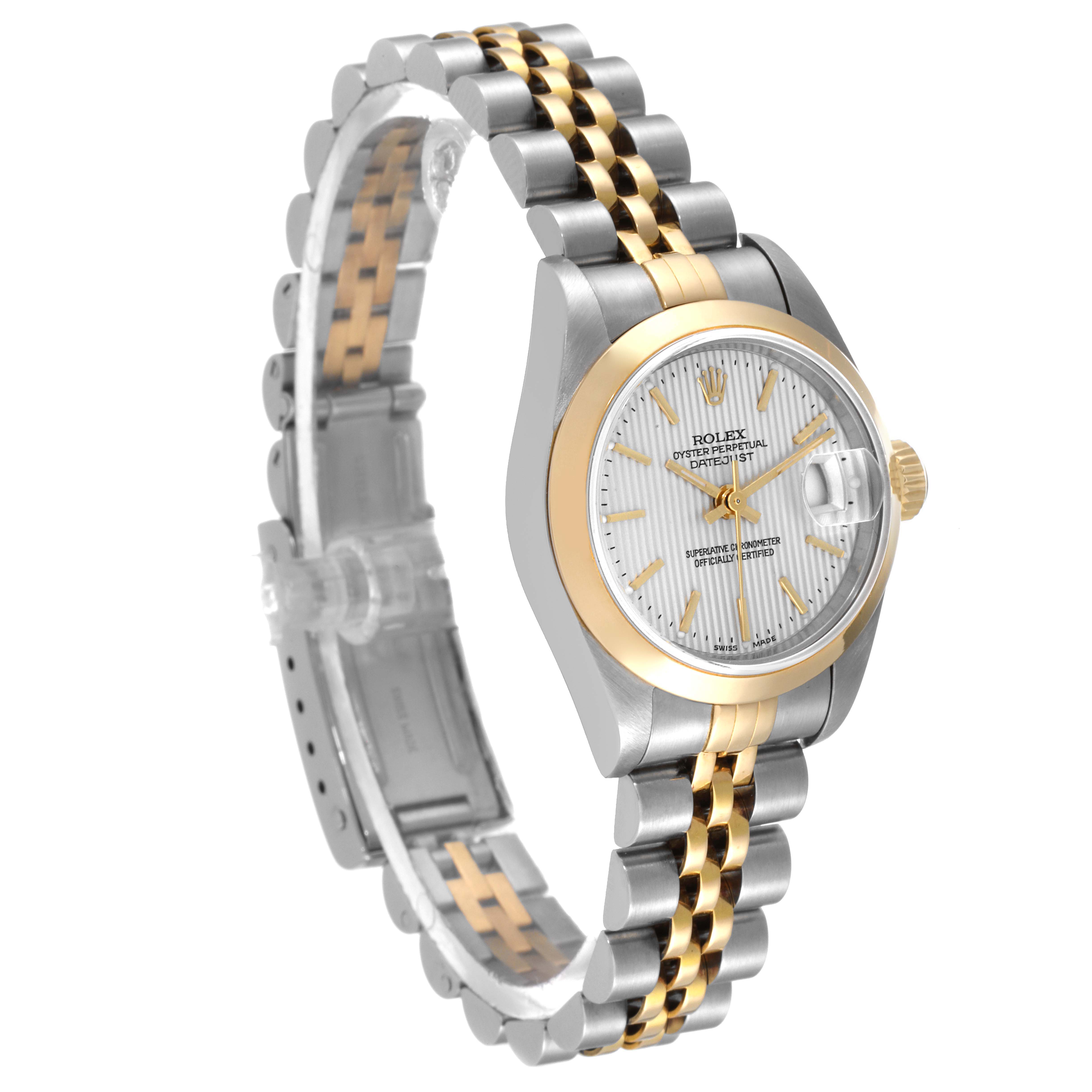 This image shows a Rolex Datejust 79163 Women's Steel and Gold (two tone) Silver Dial 79163 Women's Steel and Gold (two tone) Silver Dial watch at a side angle, displaying the face, bezel, and two-tone bracelet.