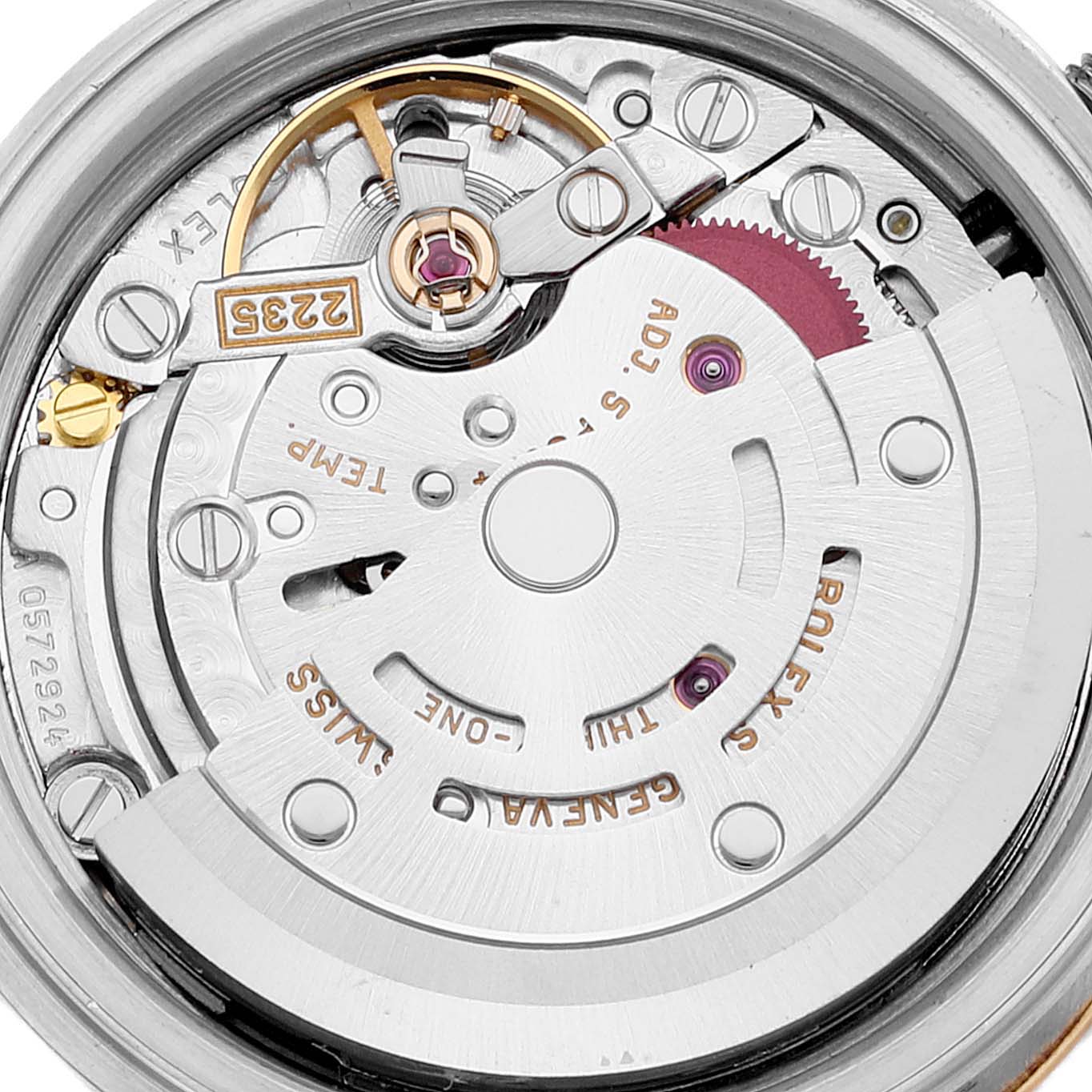 This close-up image shows the intricate internal mechanism of a Rolex Datejust 79163 Women's Steel and Gold (two tone) Silver Dial 79163 Women's Steel and Gold (two tone) Silver Dial watch.