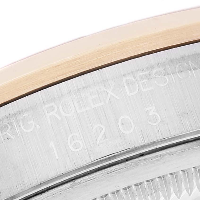 This image shows a close-up of the casing and bezel of a Rolex Datejust 16203 Men's Steel and Gold (two tone) Grey Dial 16203 Men's Steel and Gold (two tone) Grey Dial watch, focusing on the model number and brand engraving.