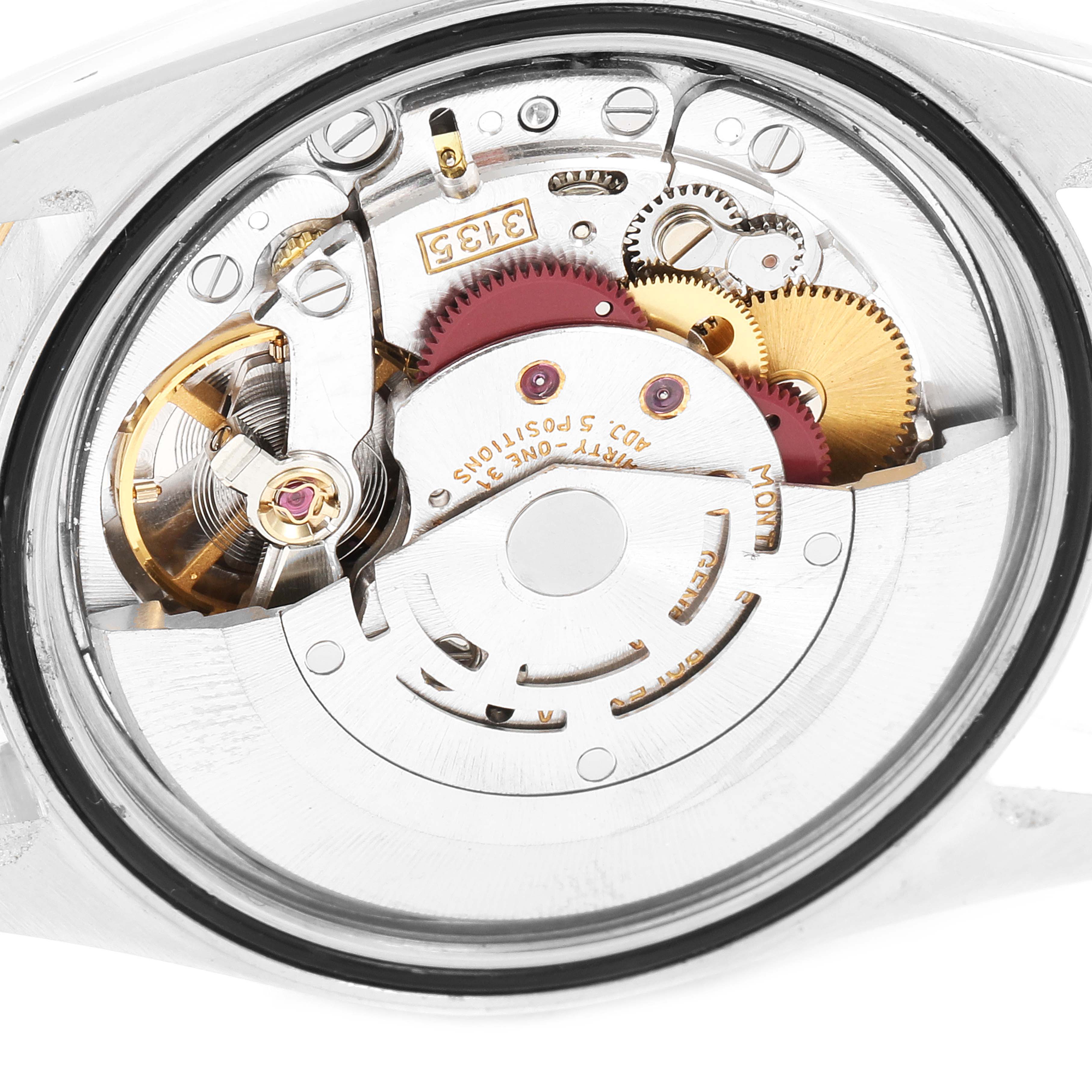 This image shows a close-up of the movement mechanism of a Rolex Datejust 16233 Men's Steel and Gold (two tone) White Dial 16233 Men's Steel and Gold (two tone) White Dial watch.