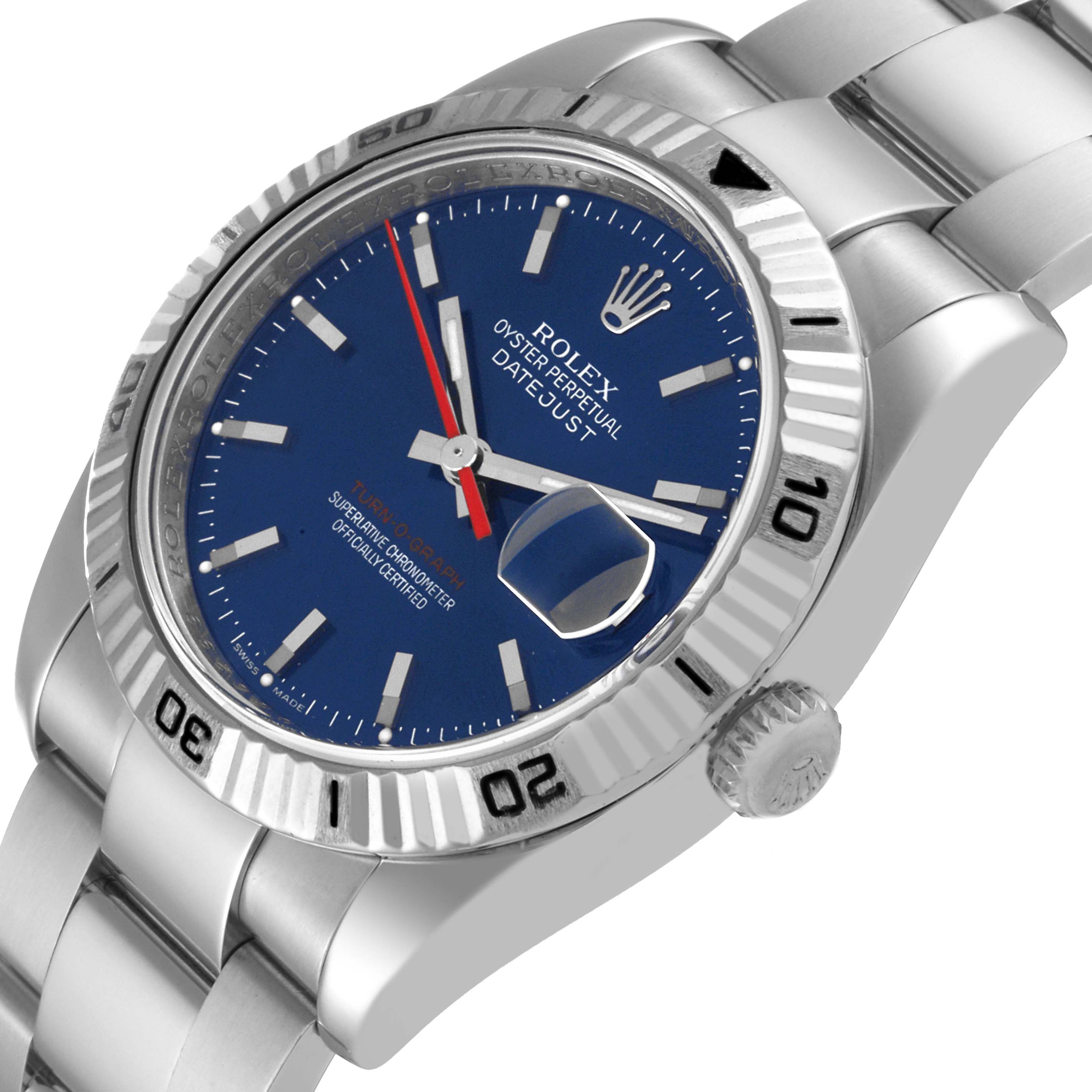 This image shows a Rolex Turn-o-Graph 116264 Men
s Stainless Steel Blue Dial 116264 Men
s Stainless Steel Blue Dial watch from an angled view, highlighting its blue face, bezel, cyclops lens, and stainless steel bracelet.