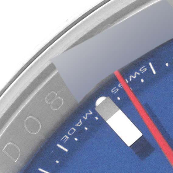 This image shows a close-up of the dial and bezel of a Rolex Turn-o-Graph 116264 Men
s Stainless Steel Blue Dial 116264 Men
s Stainless Steel Blue Dial watch.
