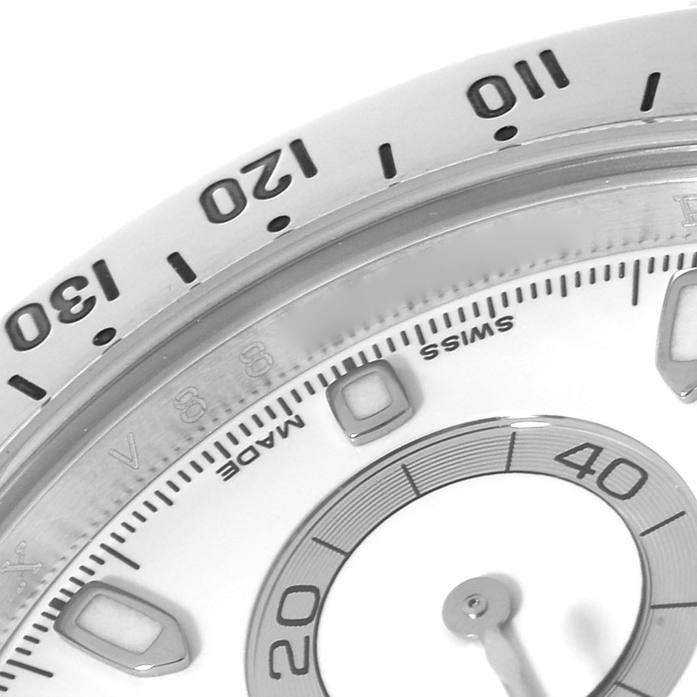 This close-up image shows the dial and part of the bezel of a Rolex Daytona 116520 Men's Stainless Steel White Dial 116520 Men's Stainless Steel White Dial watch, highlighting the minute markers and subdial.