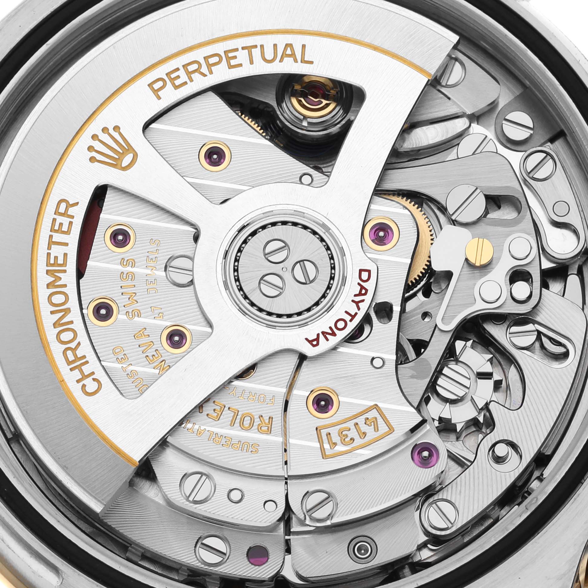 The image shows a close-up of the movement of a Rolex Daytona 126503 Men's Steel and Gold (two tone) White Dial 126503 Men's Steel and Gold (two tone) White Dial watch, highlighting its intricate mechanical components.