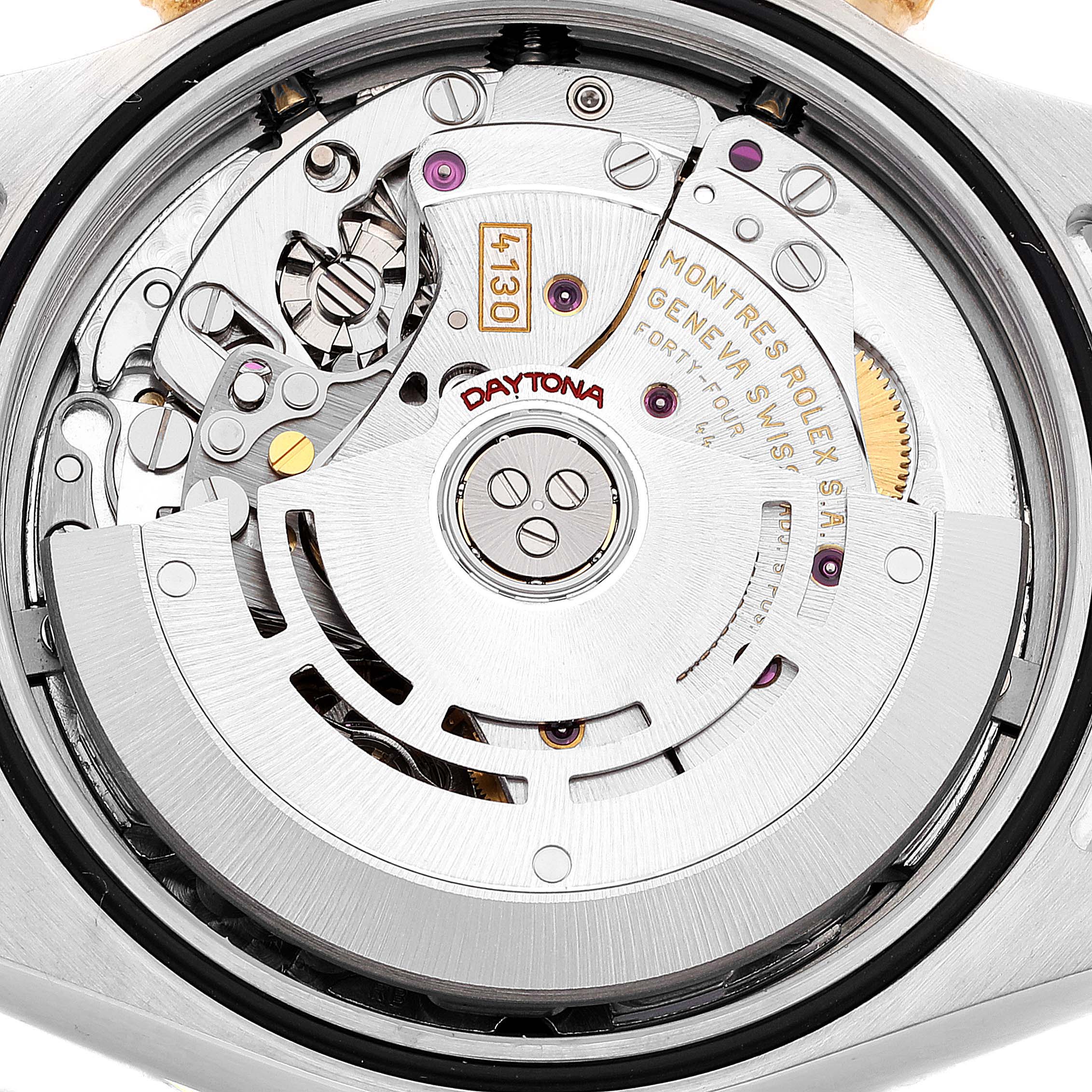 This image shows a detailed view of the movement mechanics of a Rolex Daytona 116523 Men
s Steel and Gold (two tone) White Dial 116523 Men
s Steel and Gold (two tone) White Dial watch from the back.