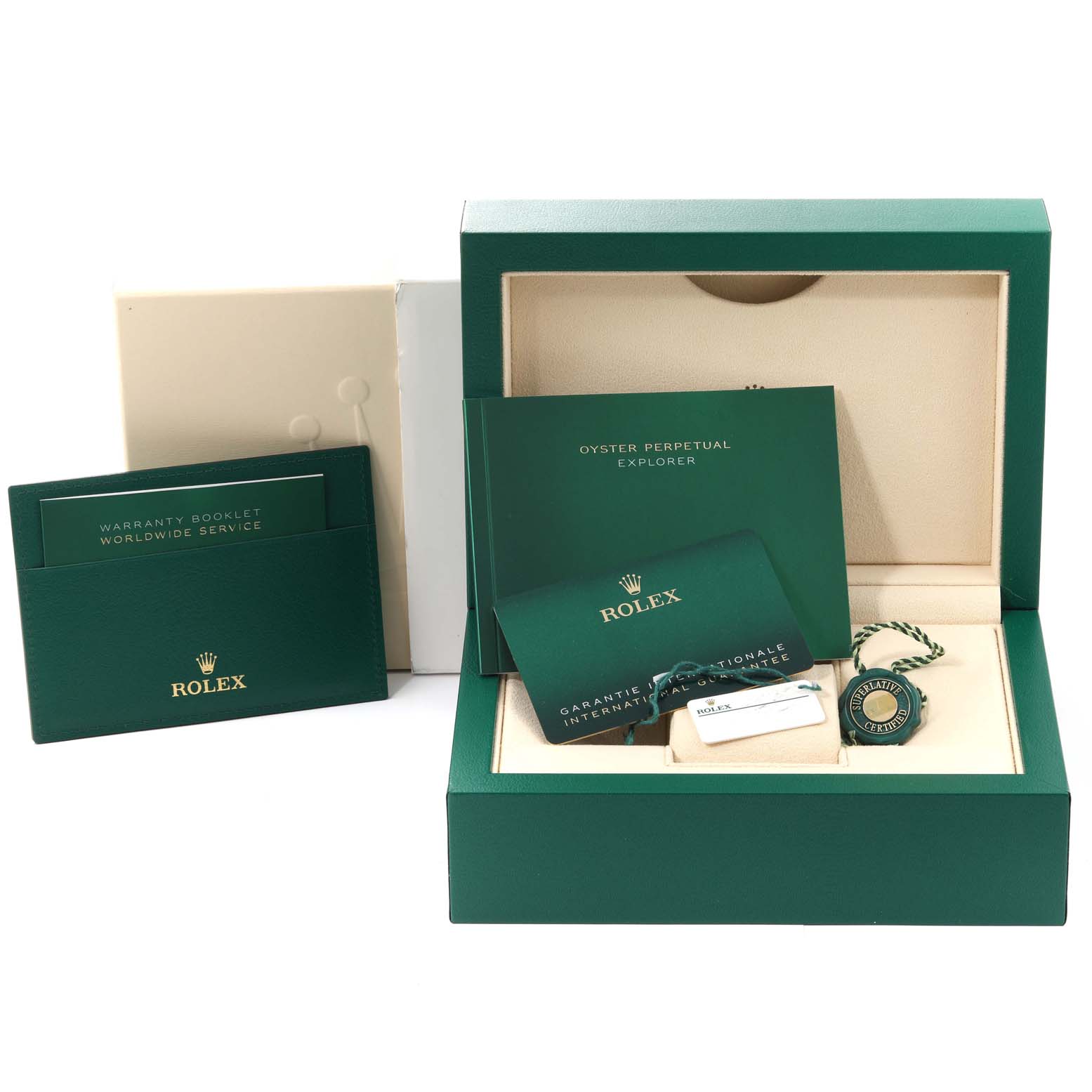 The image shows the packaging, warranty card, booklets, and accessories for a Rolex Explorer 124270 Men
s Stainless Steel Black Dial 124270 Men
s Stainless Steel Black Dial watch.
