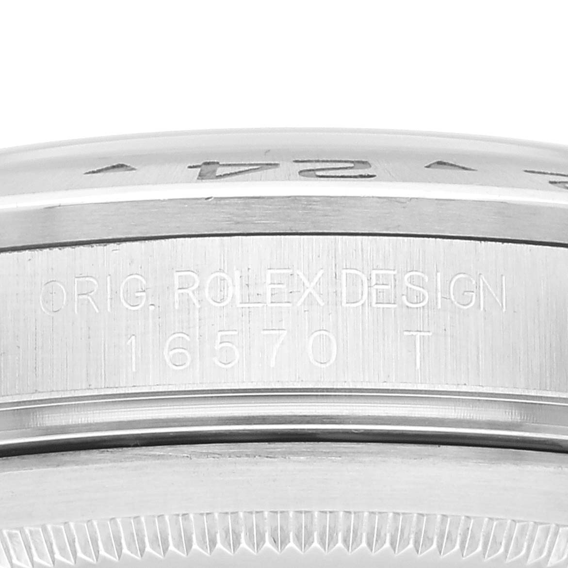 This image shows a close-up of the side of a Rolex Explorer 16570 Men
s Stainless Steel White Dial 16570 Men
s Stainless Steel White Dial model 16570, focusing on the engraved markings.