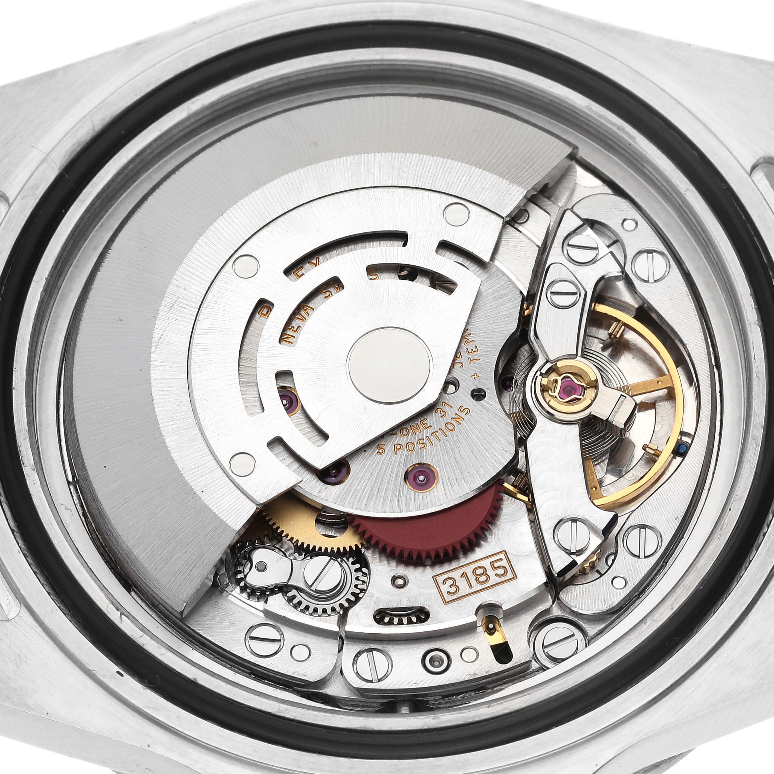 The image shows the intricate inner mechanism and movement of the Rolex Explorer 16570 Men's Stainless Steel White Dial 16570 Men's Stainless Steel White Dial model watch from a top-down angle.