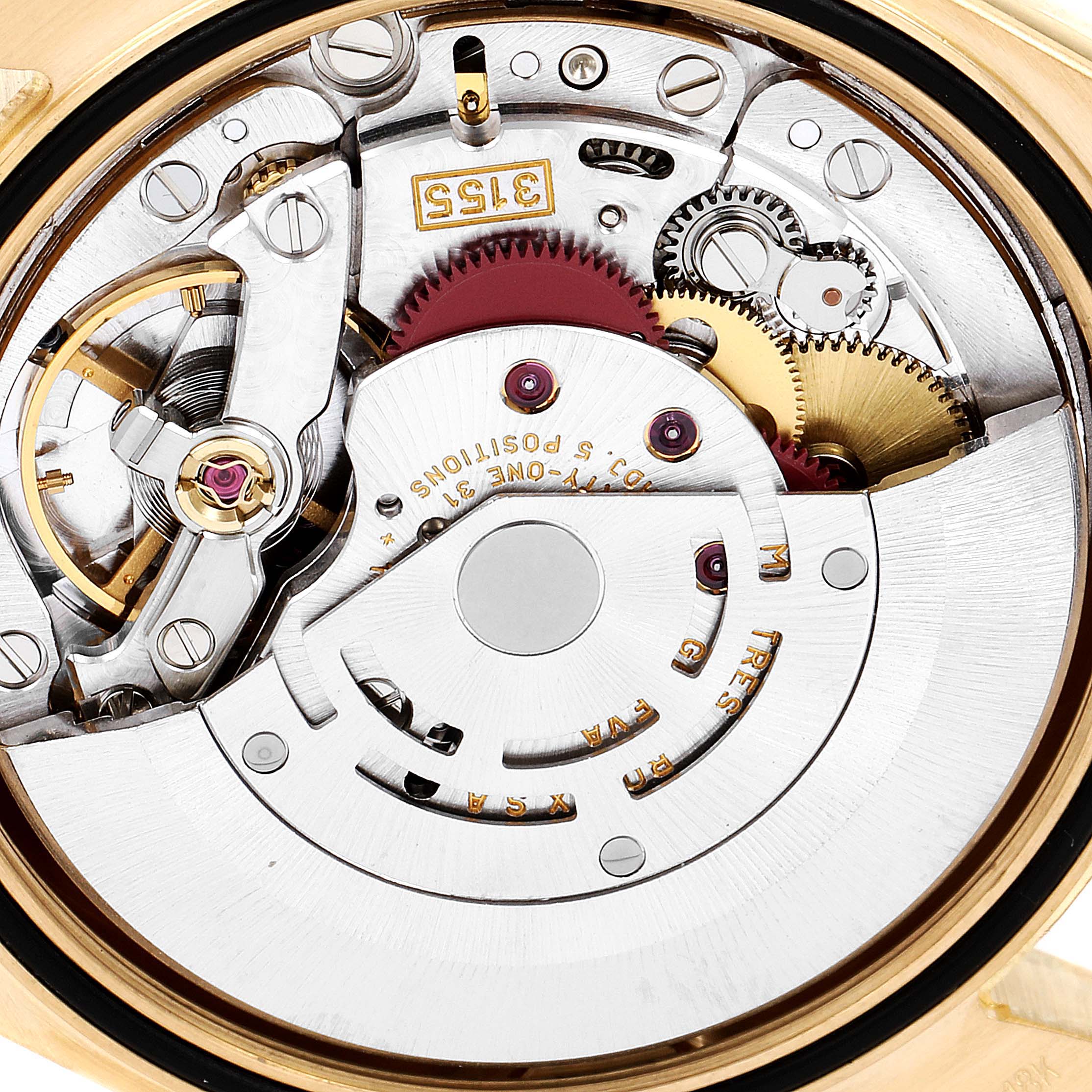 This close-up image shows the intricate inner mechanism and movement of a Rolex President 118238 Men
s Yellow Gold Black Dial 118238 Men
s Yellow Gold Black Dial model watch.