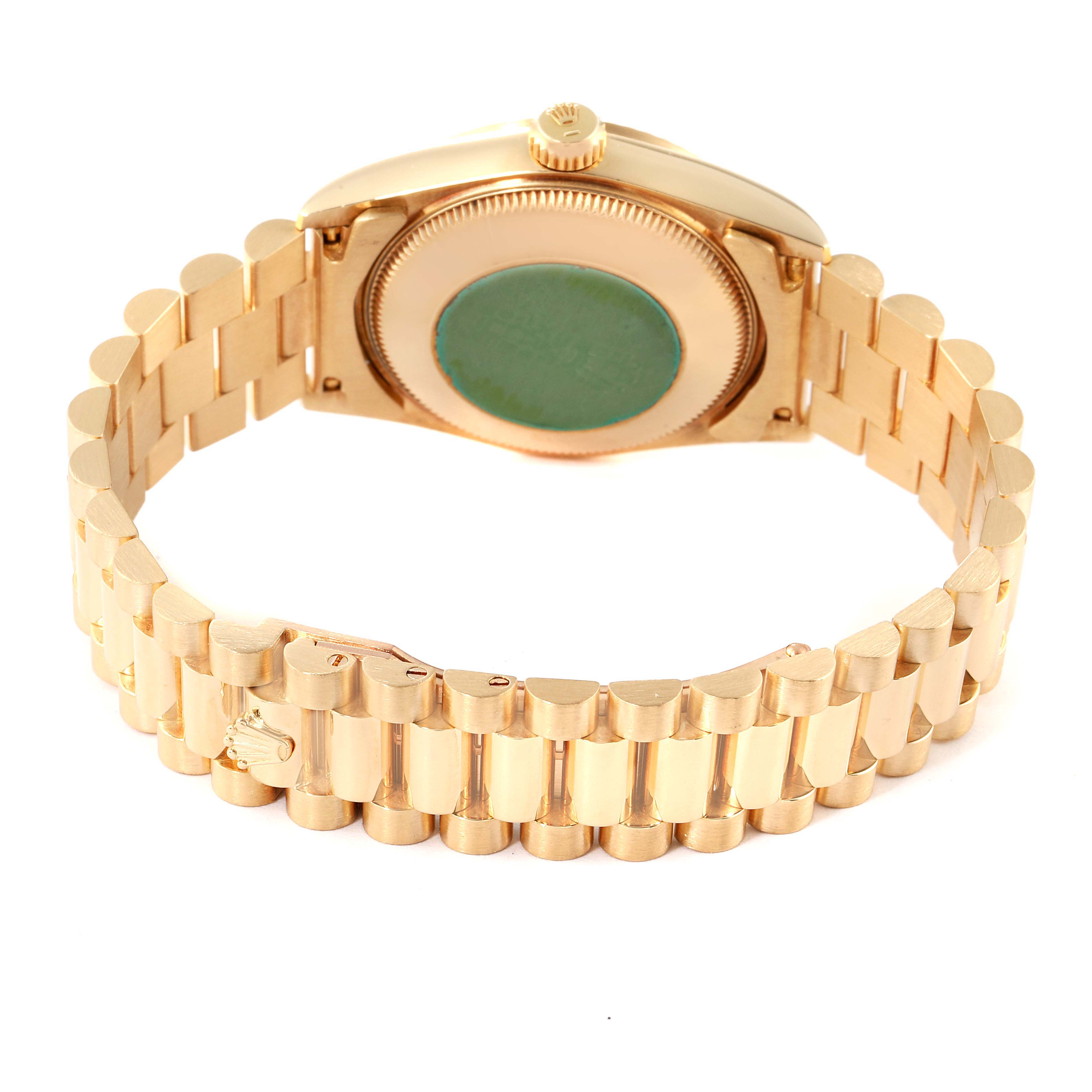 The image shows the back and bracelet of a Rolex President 68238 Women's Yellow Gold Champagne Dial 68238 Women's Yellow Gold Champagne Dial model watch, displaying the clasp and the case back.