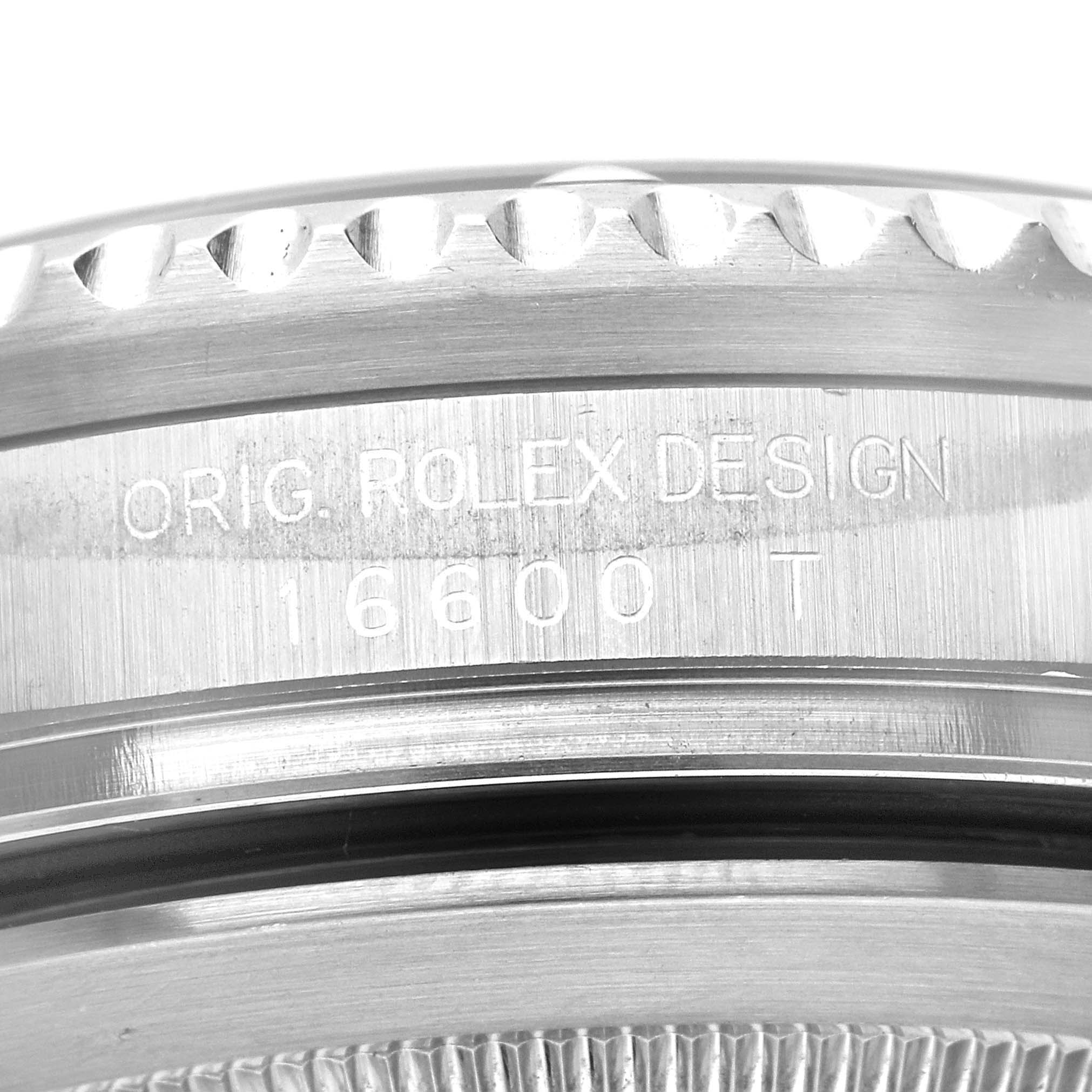 This image shows a close-up of the side engraving on a Rolex Sea-Dweller 16600 Men's Stainless Steel Black Dial 16600 Men's Stainless Steel Black Dial model, including the design and model number.