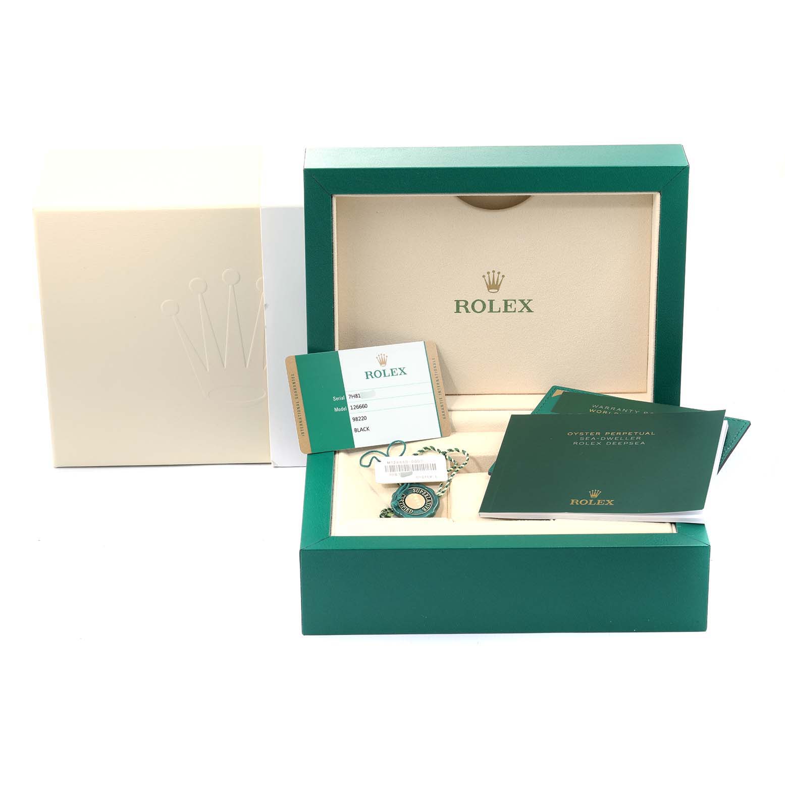 The image shows the presentation box and documentation for a Rolex Sea-Dweller 126660 Men
s Stainless Steel Black Dial 126660 Men
s Stainless Steel Black Dial, including the warranty card and instruction manual.