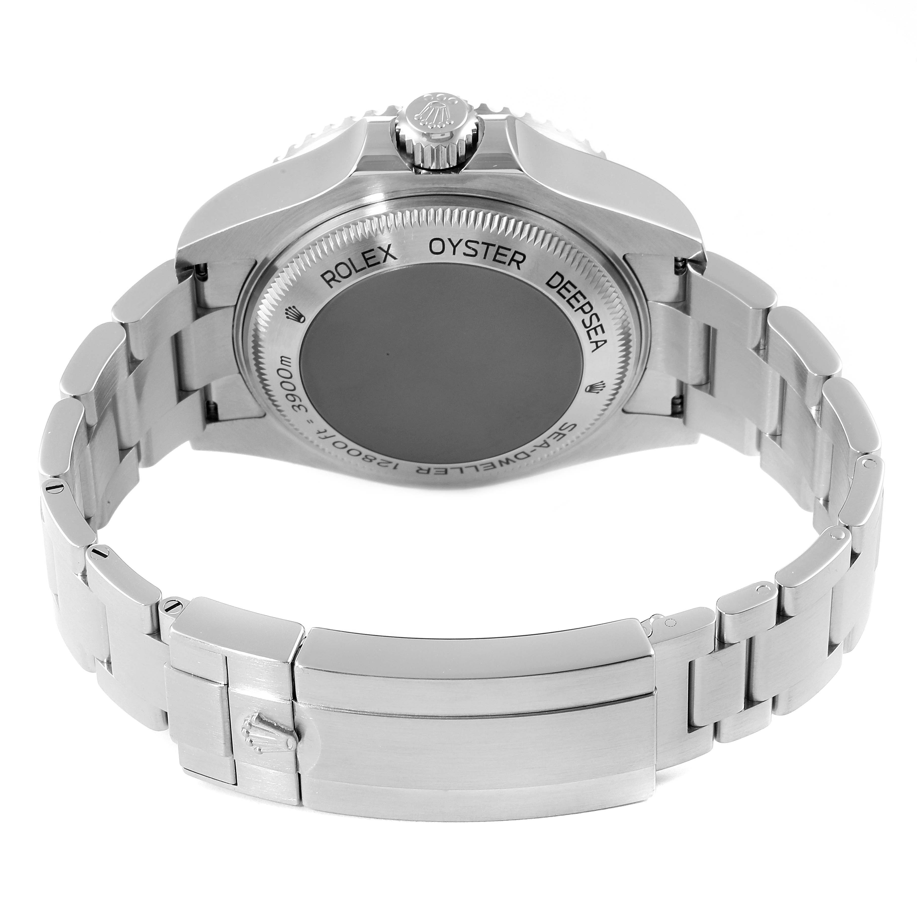 The image shows the back view of a Rolex Sea-Dweller 126660 Men
s Stainless Steel Black Dial 126660 Men
s Stainless Steel Black Dial watch, focusing on its case back, bracelet, and clasp.