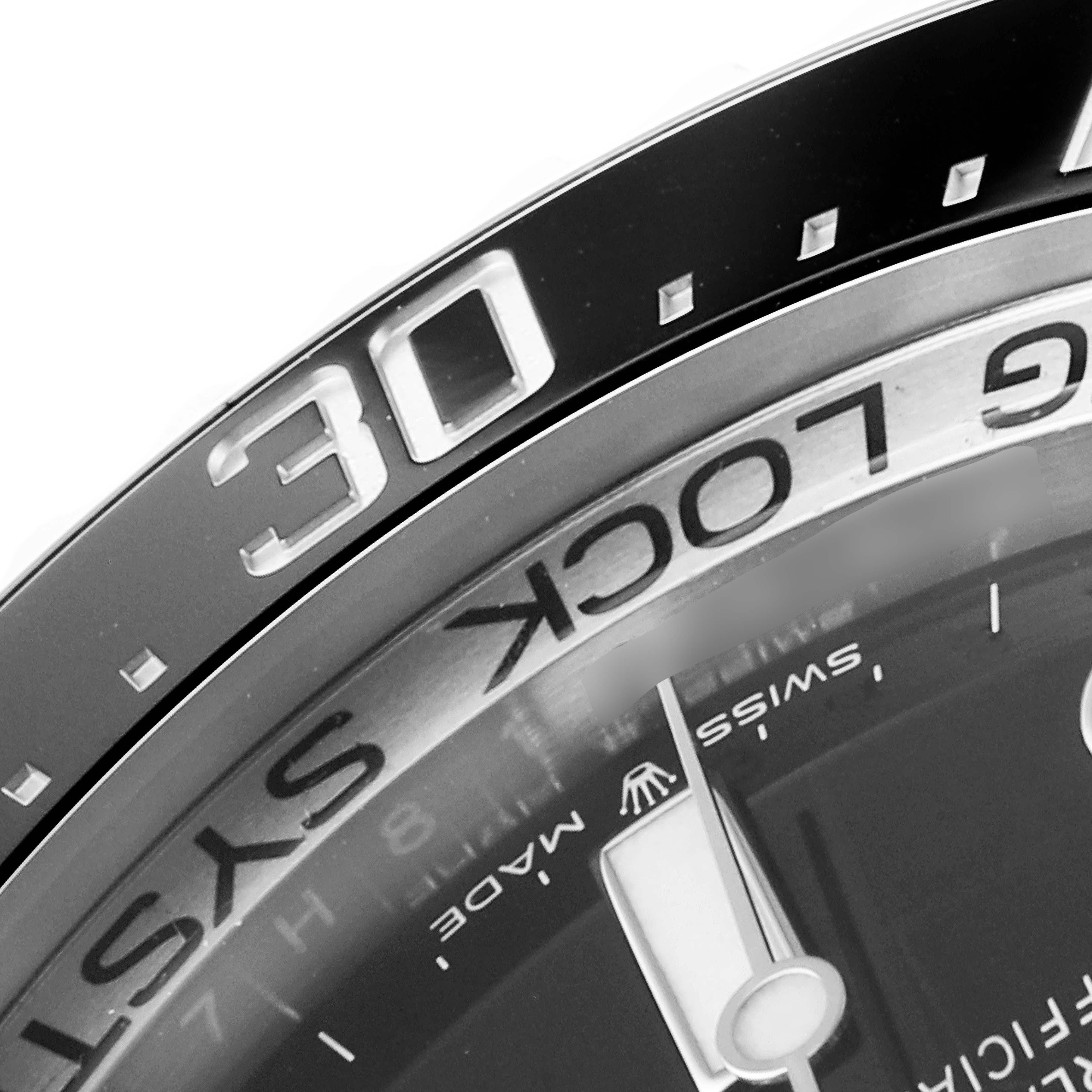 The image shows a close-up angle of the bezel and part of the dial of the Rolex Sea-Dweller 126660 Men
s Stainless Steel Black Dial 126660 Men
s Stainless Steel Black Dial watch, highlighting the "30" minute mark.