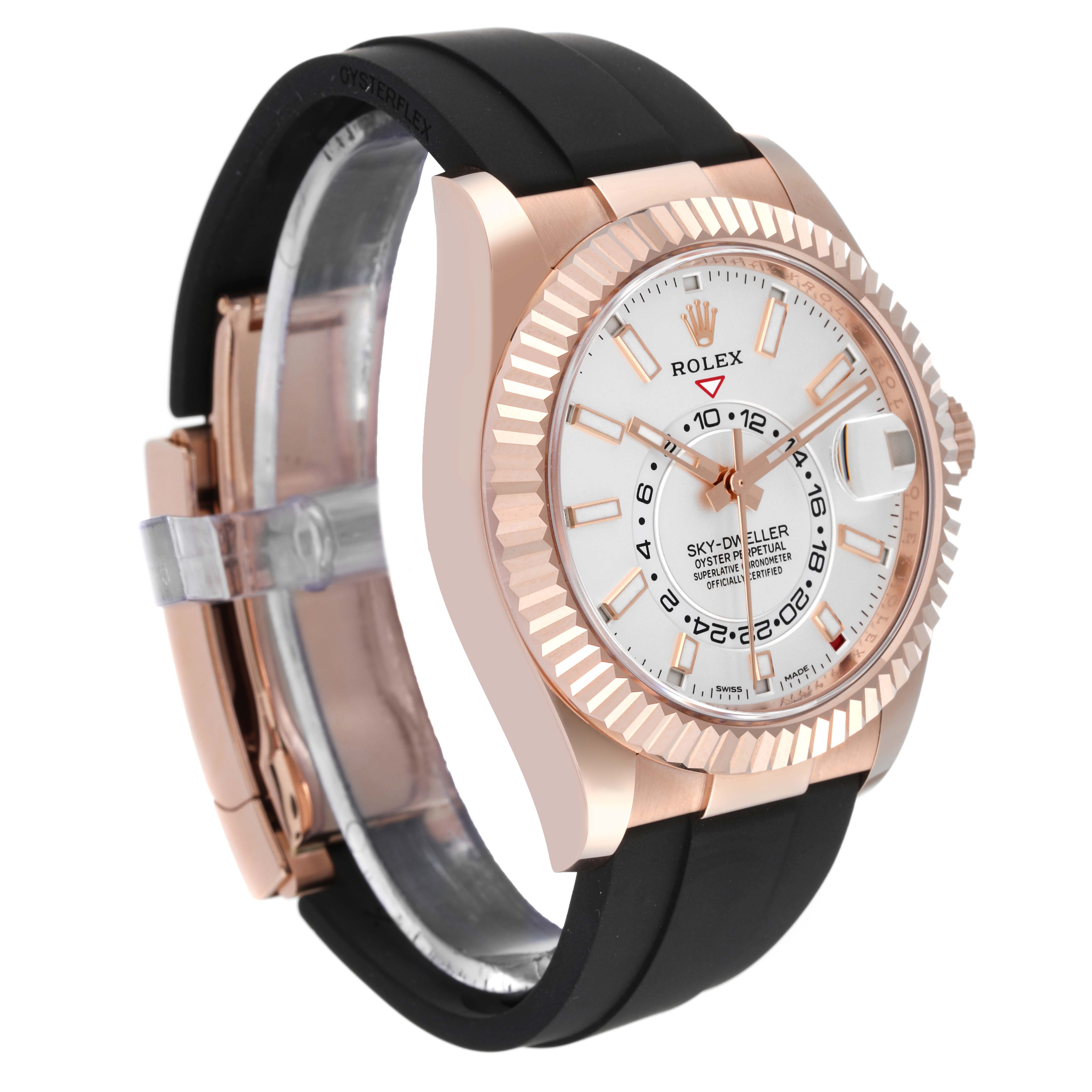 This image shows a Rolex Sky-Dweller 326235 Men's Rose Gold White Dial 326235 Men's Rose Gold White Dial watch angled from the left side, featuring its bezel, dial, and black strap.