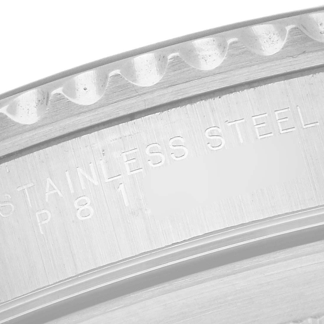 This is a close-up view of the bezel and the engraved stainless steel text on a Rolex Submariner 14060 Men
s Stainless Steel Black Dial 14060 Men
s Stainless Steel Black Dial watch.