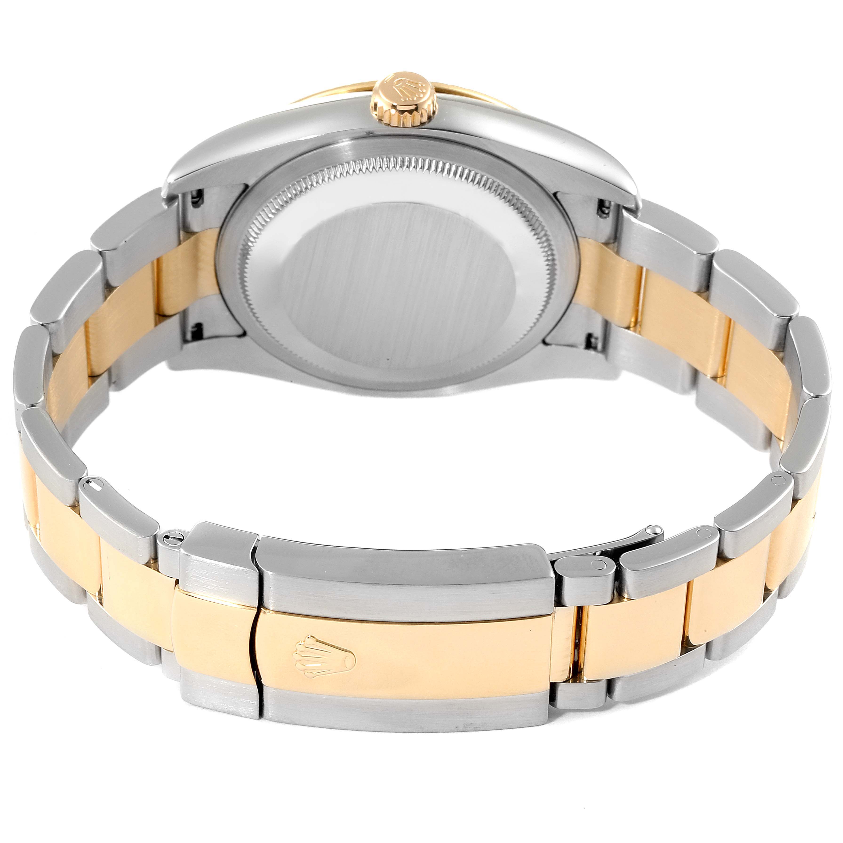 This image shows the back and bracelet of a Rolex Turn-o-Graph 116263 Men
s Steel and Gold (two tone) Grey Dial 116263 Men
s Steel and Gold (two tone) Grey Dial watch, highlighting the clasp and crown.
