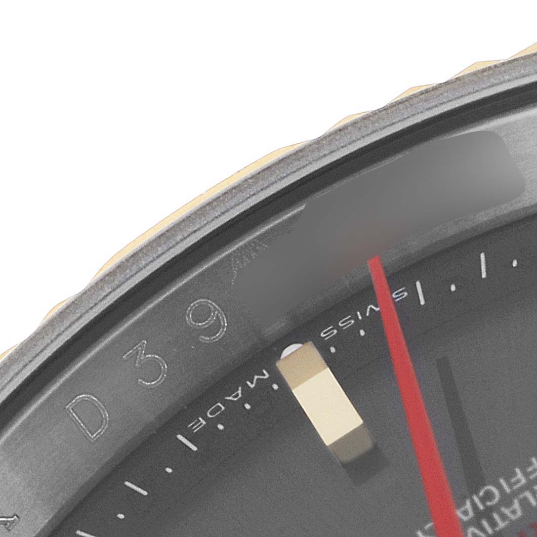 This close-up image shows part of the bezel, dial, and red second hand of the Rolex Turn-o-Graph 116263 Men
s Steel and Gold (two tone) Grey Dial 116263 Men
s Steel and Gold (two tone) Grey Dial watch.