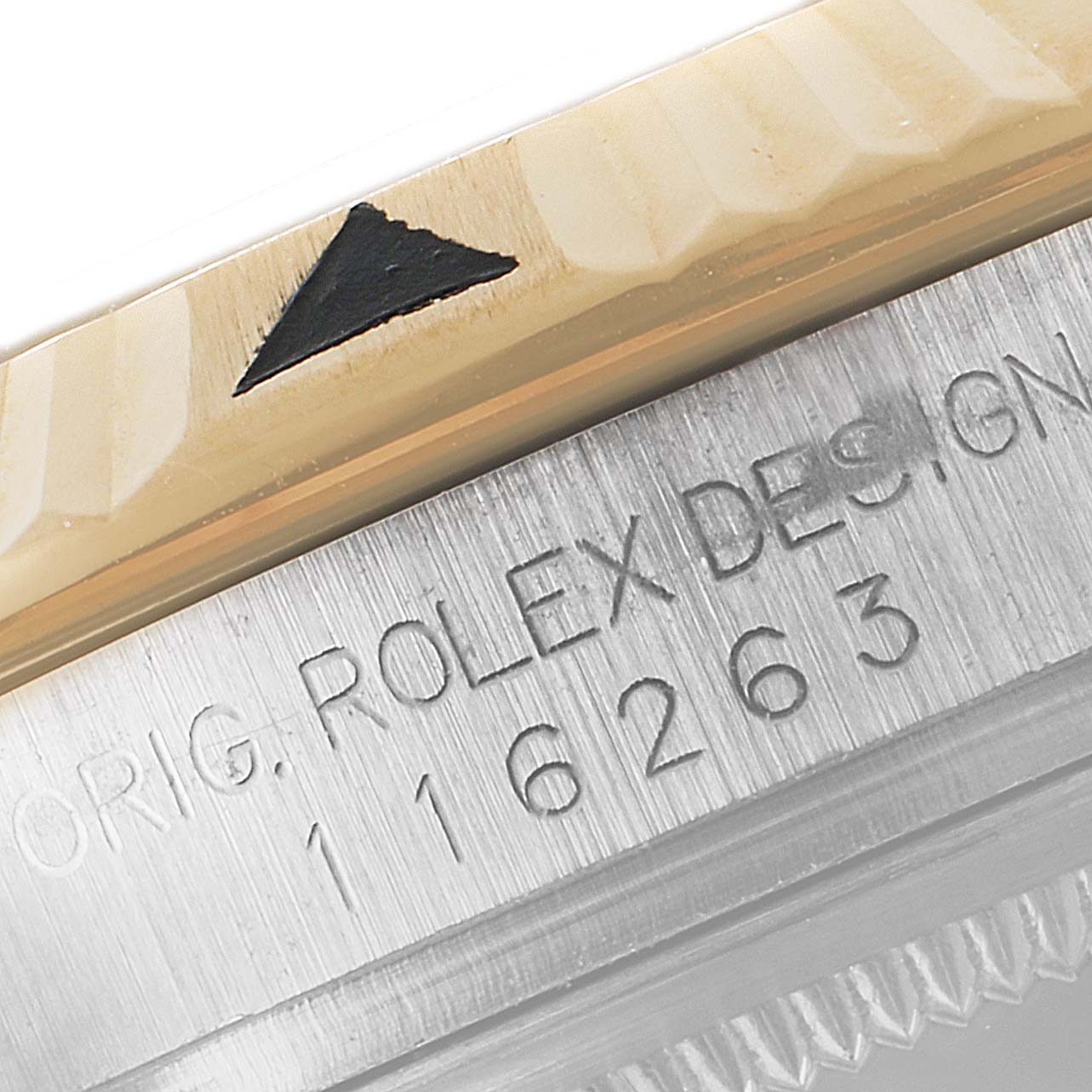 The image shows a close-up of the bezel and the serial number engraving on the Turn-o-Graph model by Rolex.