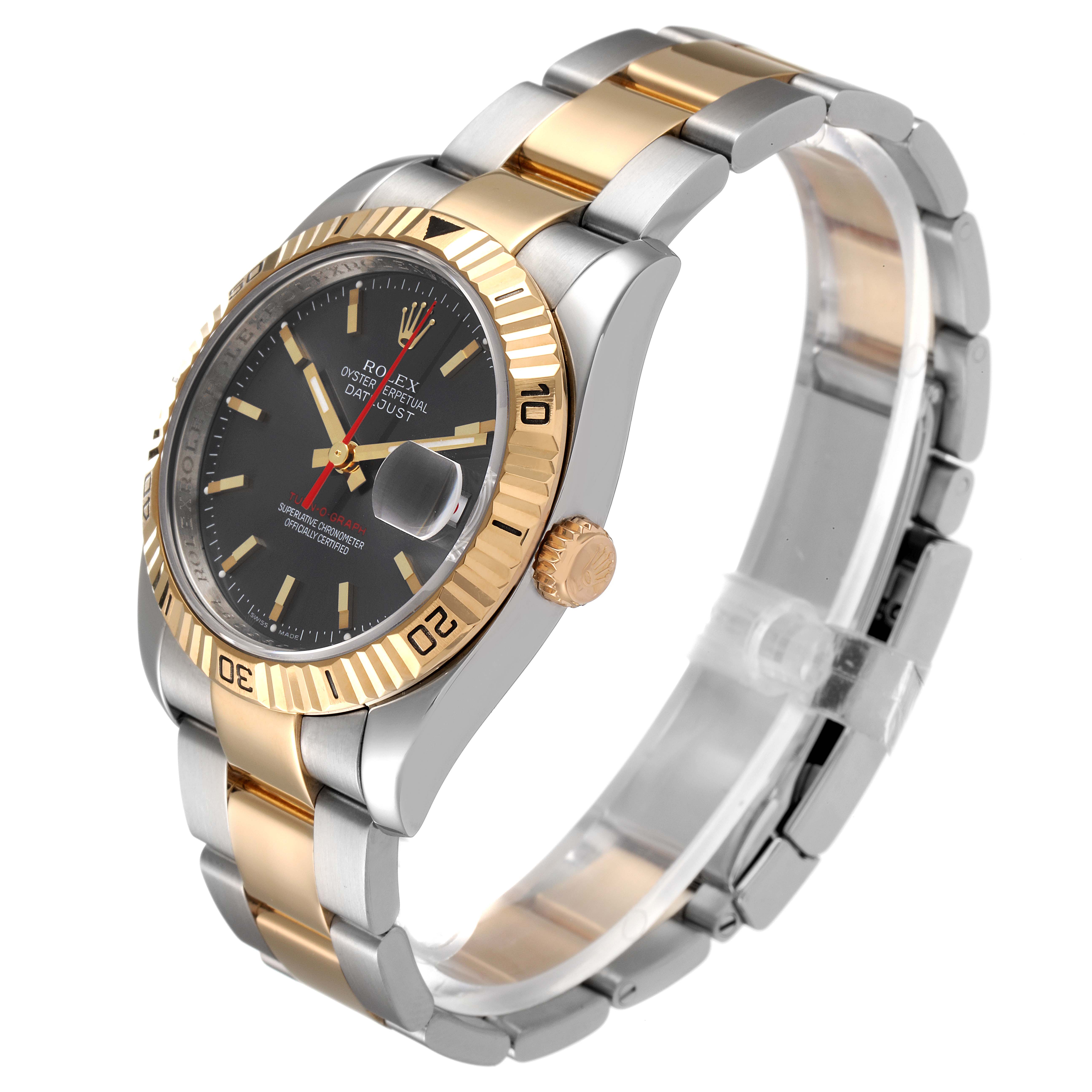 The image shows a Rolex Turn-o-Graph 116263 Men
s Steel and Gold (two tone) Grey Dial 116263 Men
s Steel and Gold (two tone) Grey Dial watch at a tilted angle, highlighting its two-tone band, bezel, and dial.
