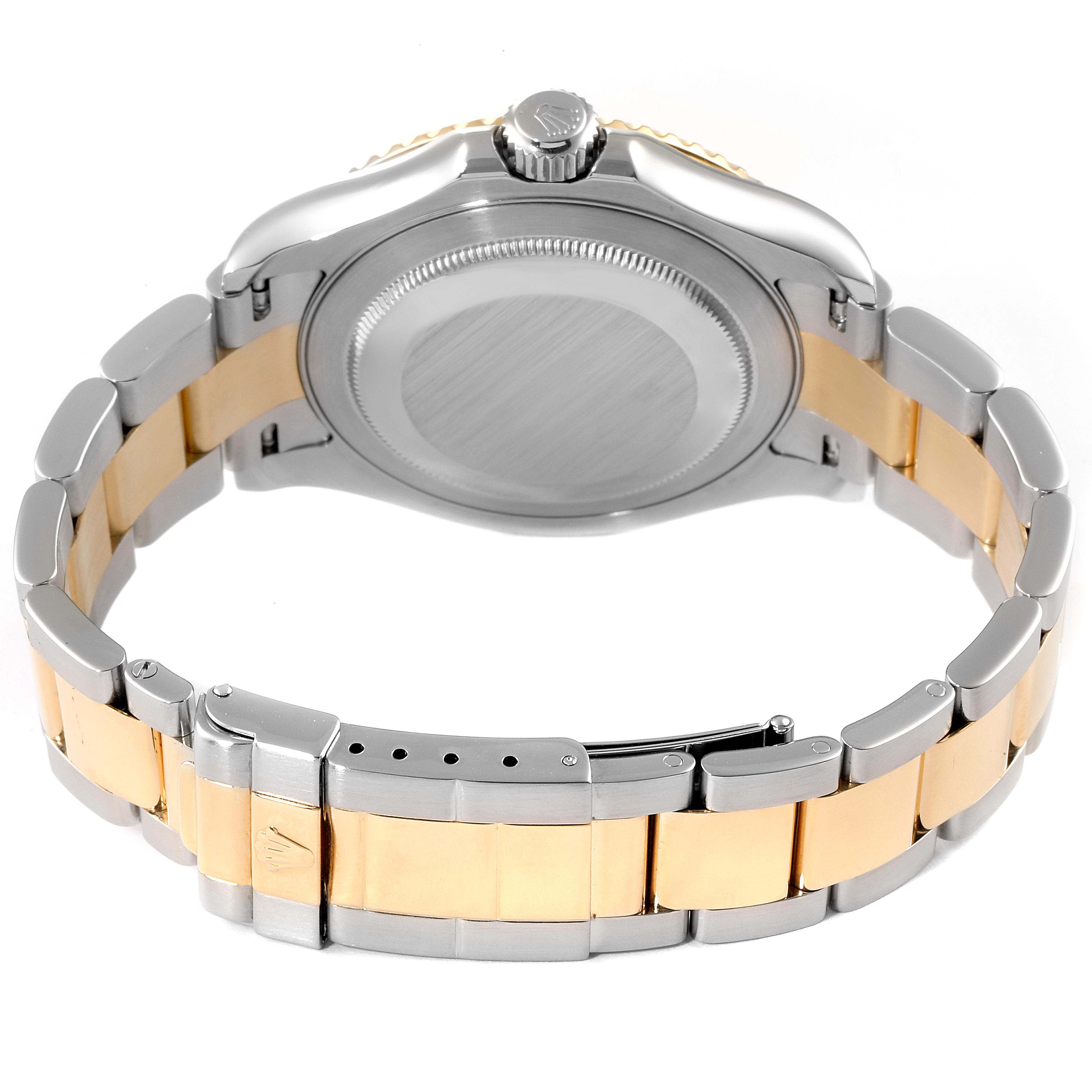 This image shows the back view of a Rolex Yacht-Master 16623 Men
s Steel and Gold (two tone) White Dial 16623 Men
s Steel and Gold (two tone) White Dial watch, highlighting the stainless steel and gold Oyster bracelet and case back.