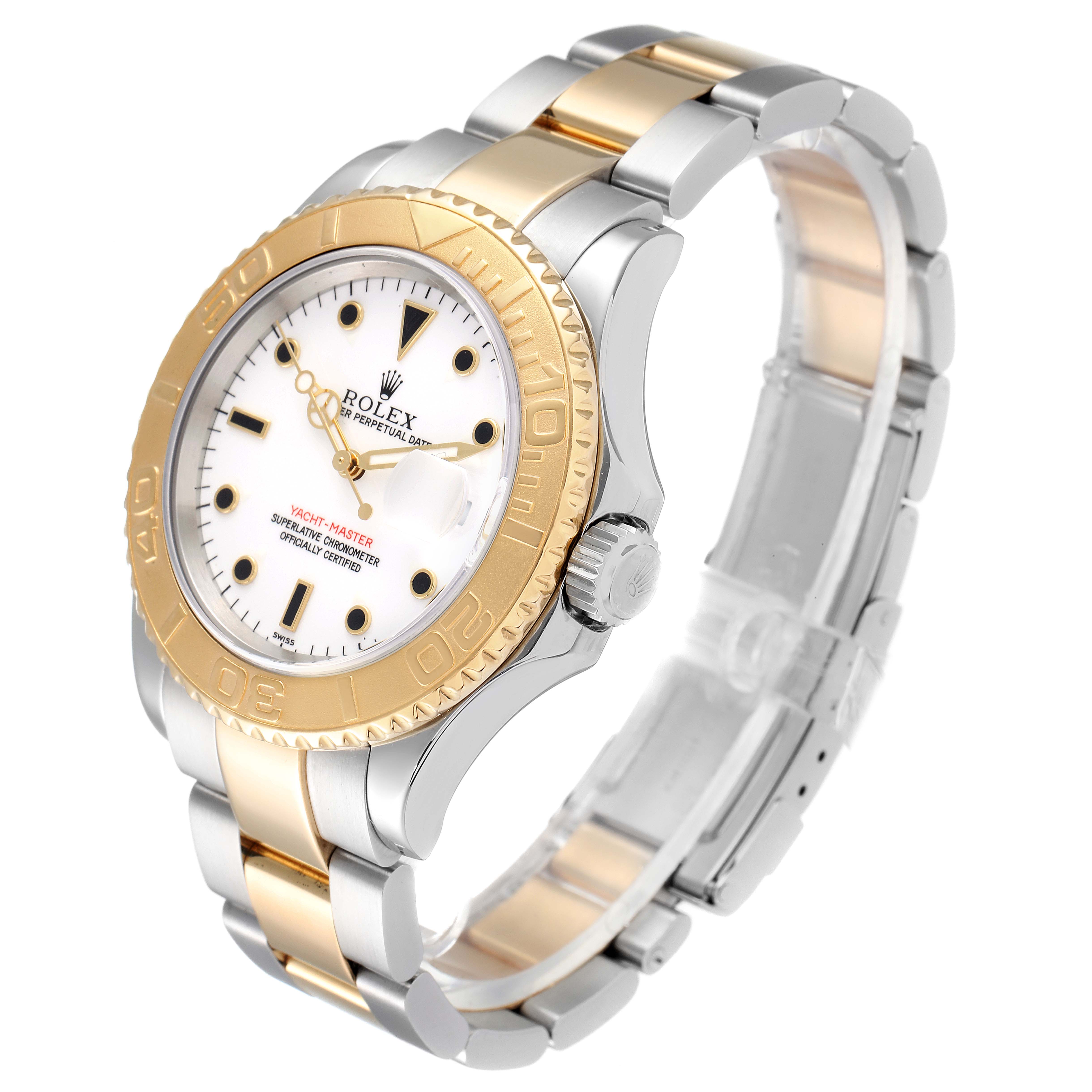The Rolex Yacht-Master 16623 Men
s Steel and Gold (two tone) White Dial 16623 Men
s Steel and Gold (two tone) White Dial watch is shown at a three-quarter angle, displaying its dial, bezel, case, crown, and bracelet.