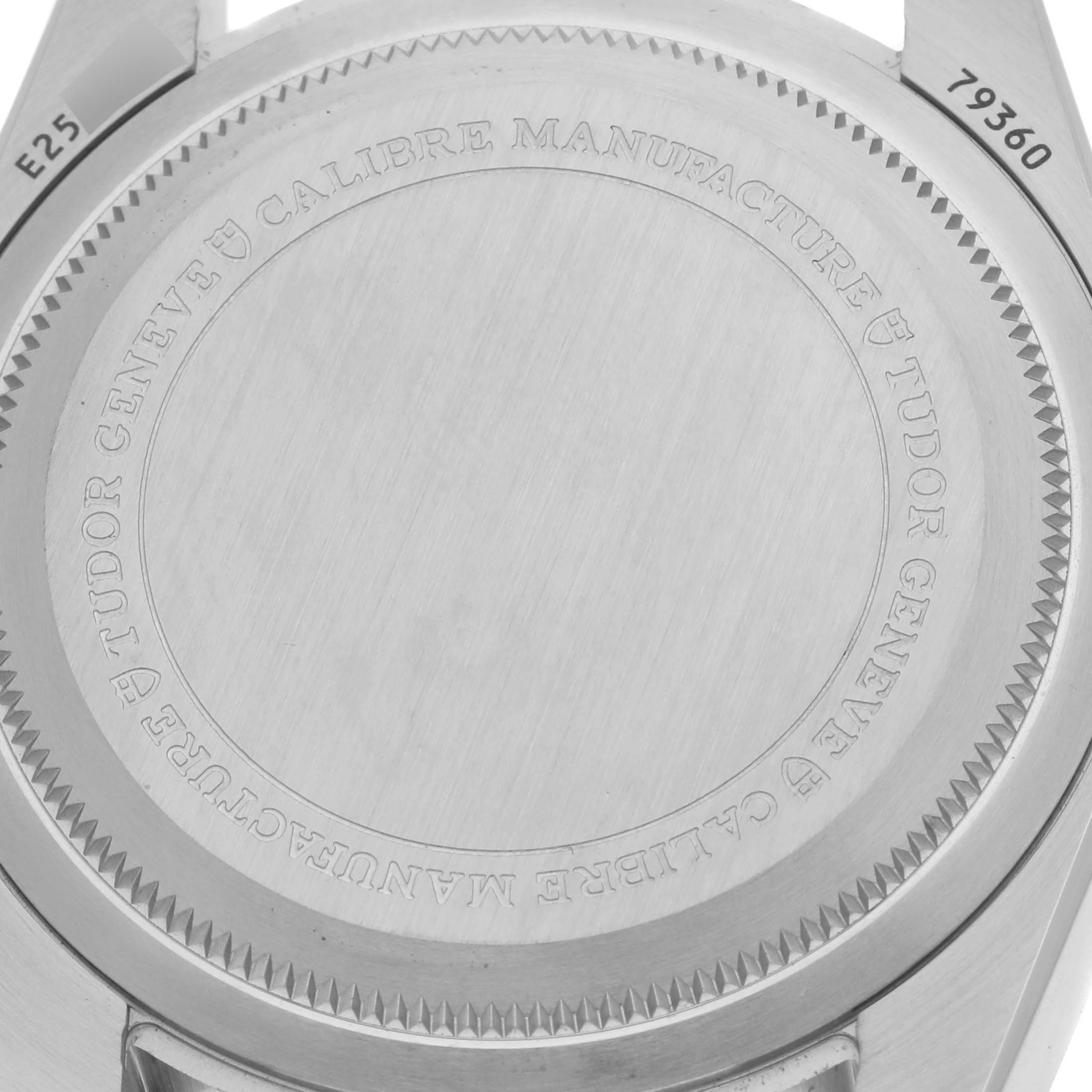 The image shows the case back of the Tudor Heritage Black Bay watch, highlighting its engraved details.