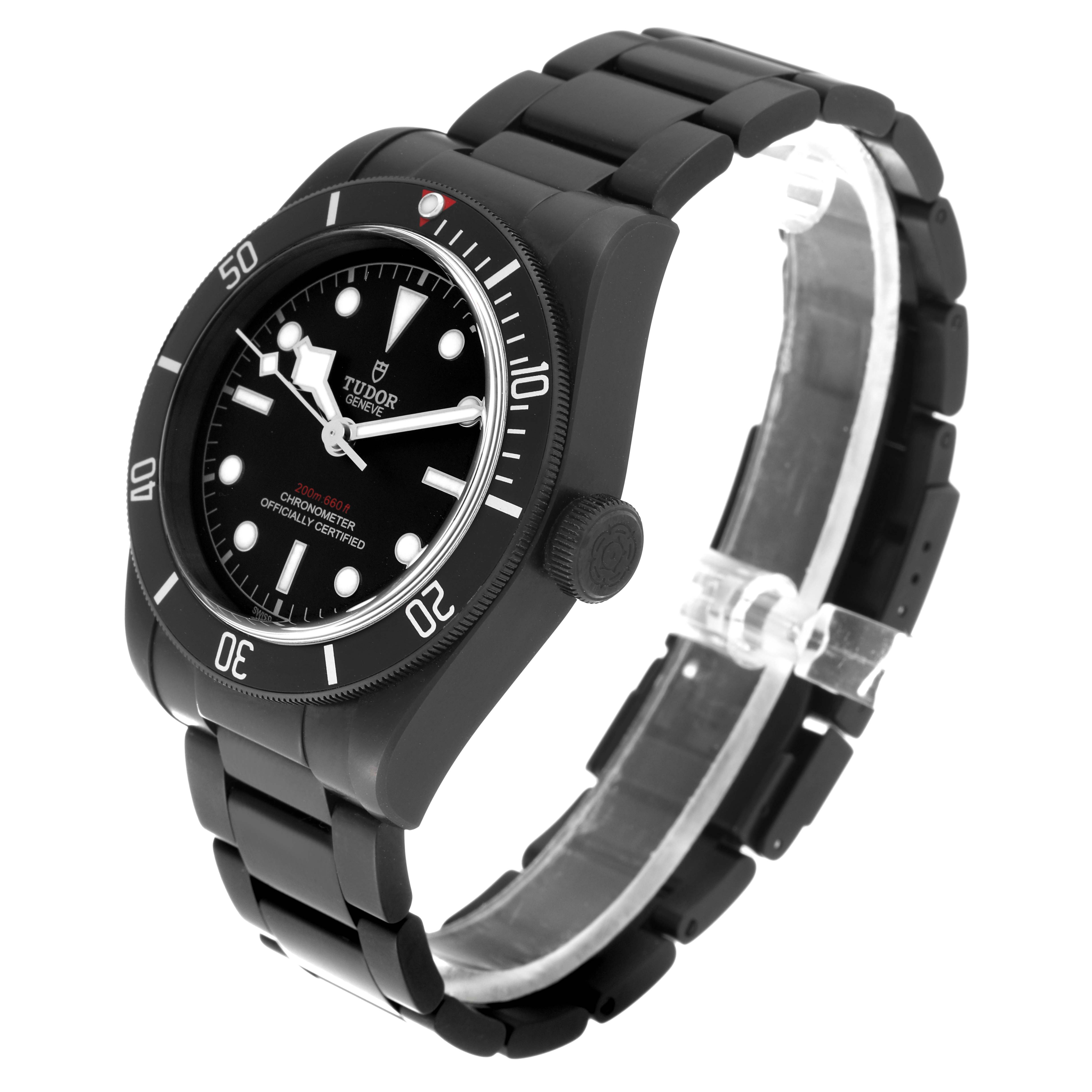 The Tudor Heritage Black Bay 79230DK Men's Stainless Steel Black Dial 79230DK Men's Stainless Steel Black Dial watch is shown at an angled side view, displaying the face, bezel, crown, and stainless steel bracelet.