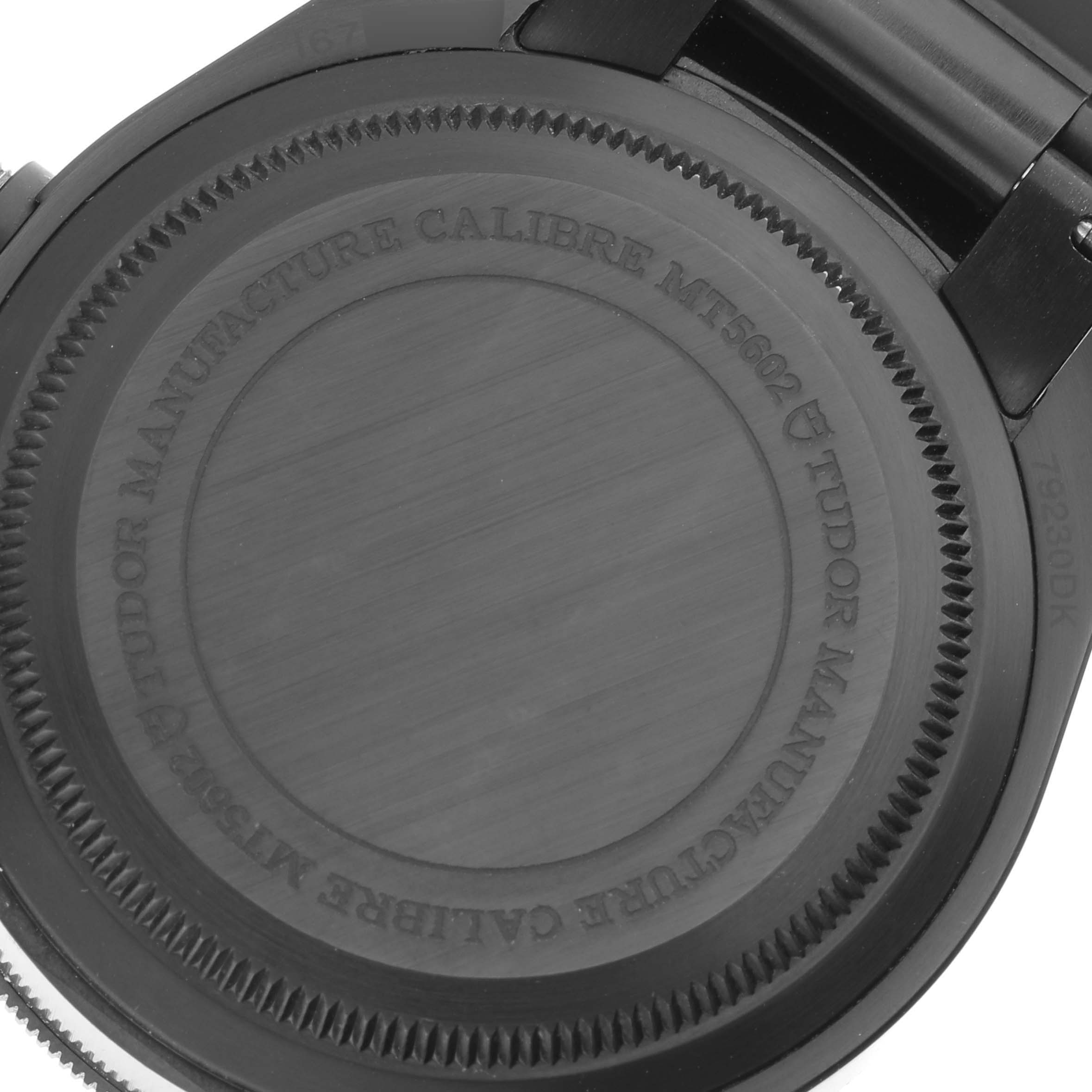 This image shows the back case of the Tudor Heritage Black Bay 79230DK Men's Stainless Steel Black Dial 79230DK Men's Stainless Steel Black Dial watch, highlighting its branding and model details.