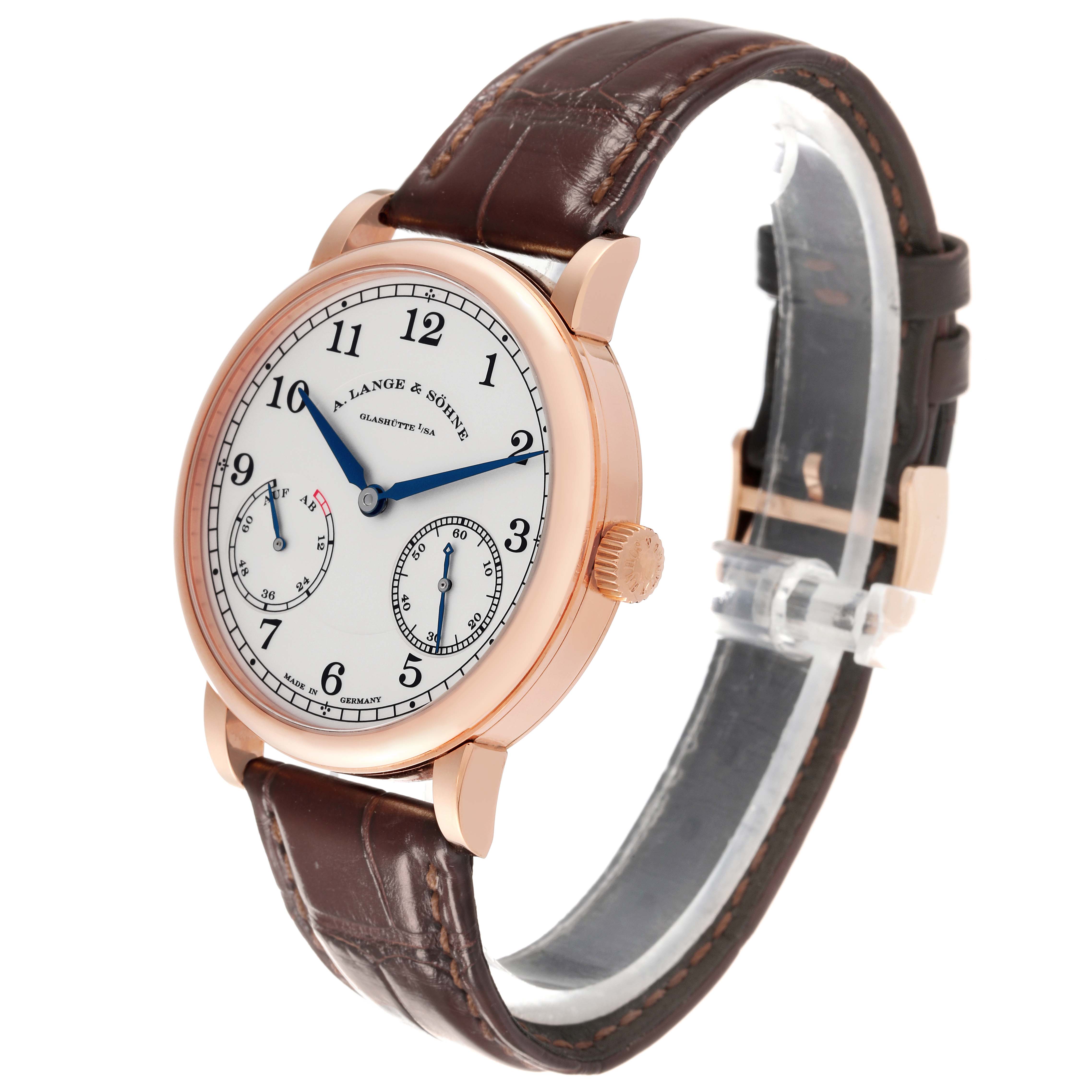 This image shows an A. Lange 
Sohne 1815 234.032 Men
s Rose Gold Silver Dial watch from a slight front-left angle, displaying its face and brown leather strap.