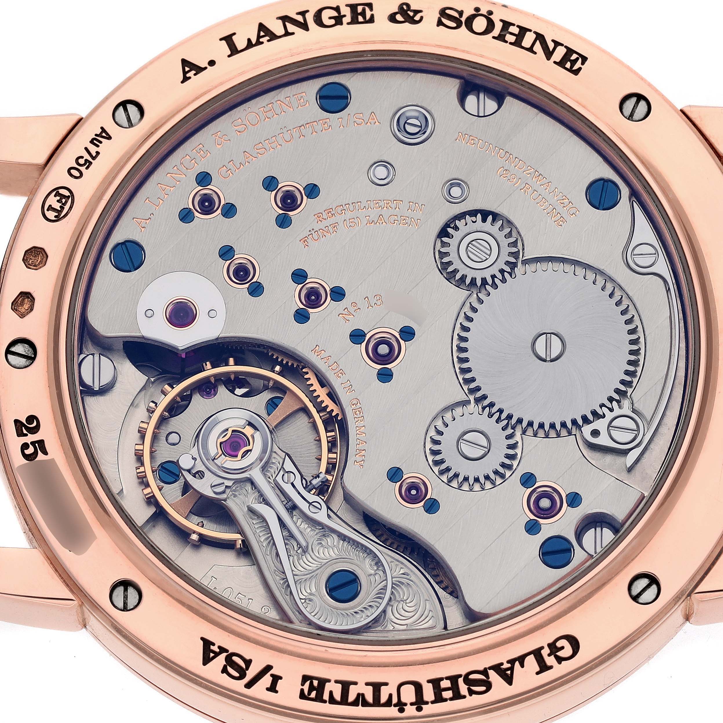 The image shows a close-up of the movement and inner mechanisms of an 1815 model by A. Lange 
Söhne from the back.