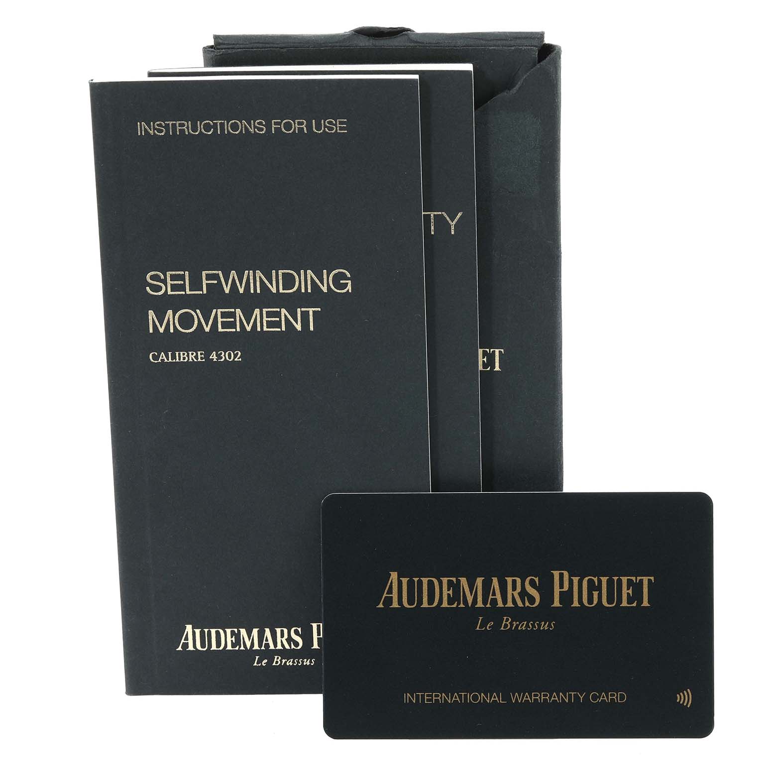 This image shows the instructions manual and international warranty card for the Audemars Piguet Royal Oak Offshore 15710ST.OO.A032CA.01 Men's Stainless Steel Blue Dial 15710ST.OO.A032CA.01 Men's Stainless Steel Blue Dial model.