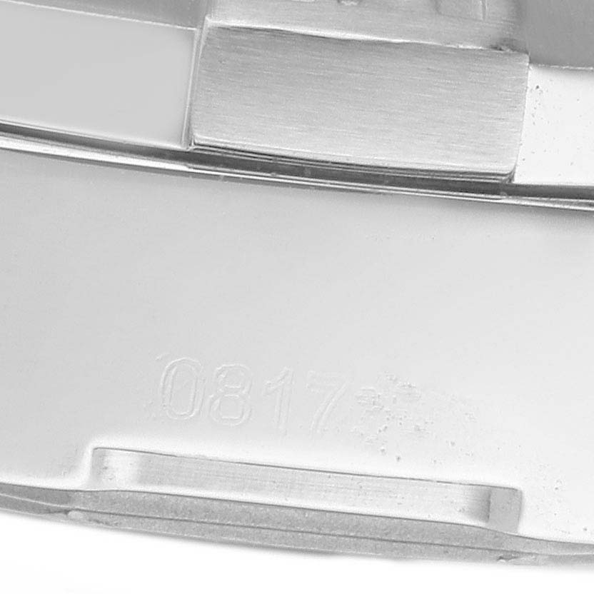 The image shows a partial view of the clasp from a Breitling Avenger A32390 Men
s Stainless Steel Black Dial model watch, highlighting engraved numbers.