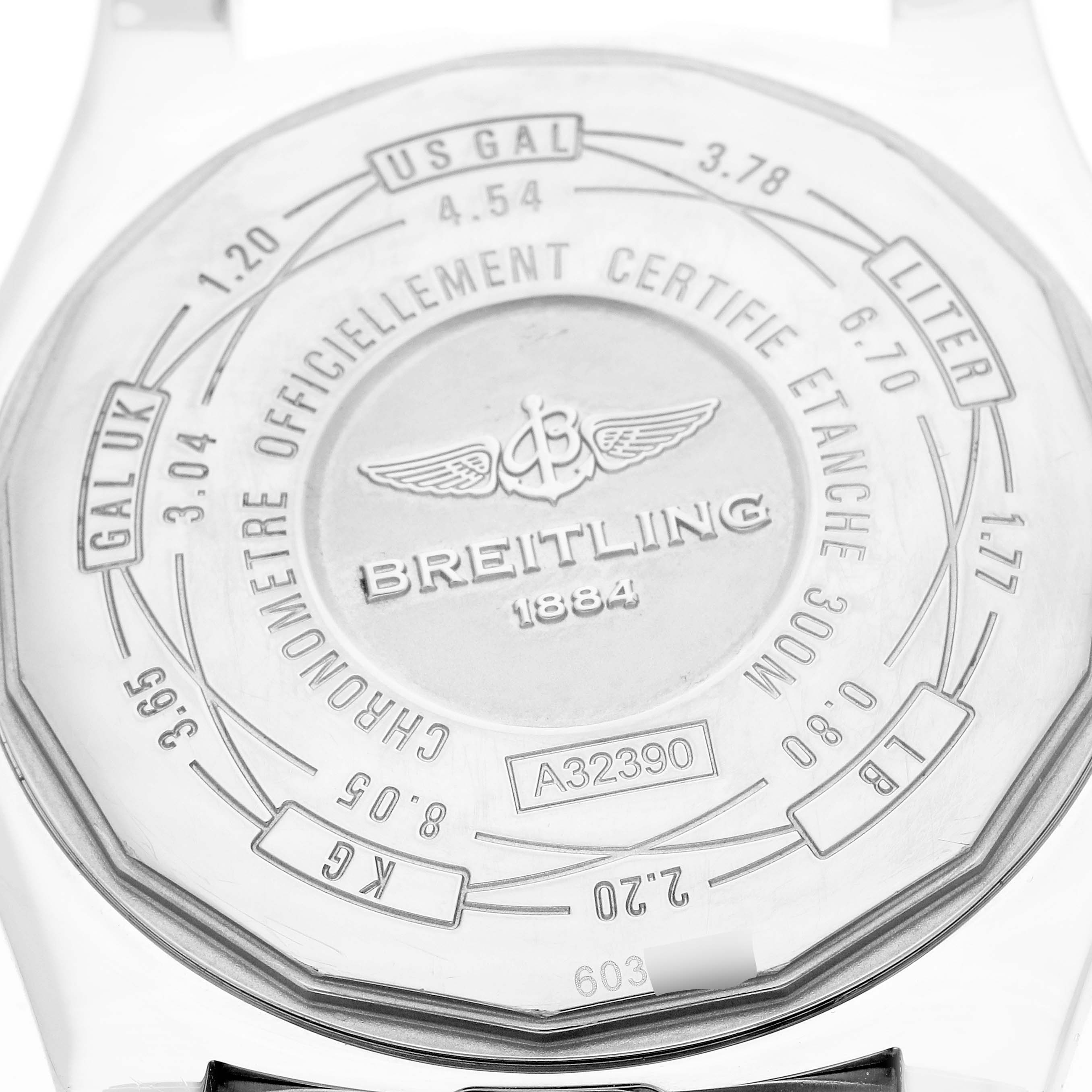The image shows the back case of a Breitling Avenger A32390 Men
s Stainless Steel Black Dial watch, displaying engravings and markings.