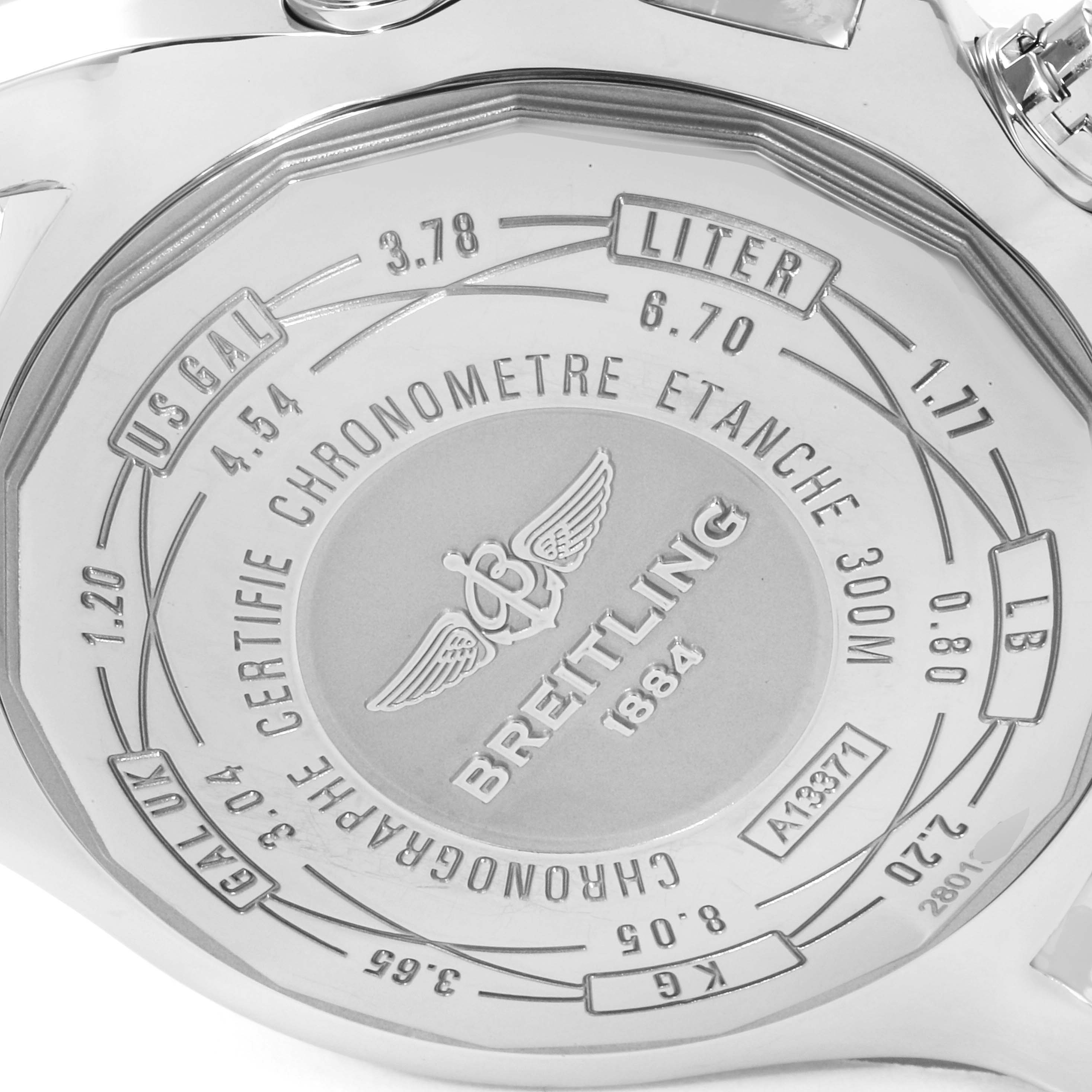 The image shows the back of a Breitling Avenger A13371 Men's Stainless Steel Black Dial A13371 Men's Stainless Steel Black Dial watch, featuring engravings and measurement conversions.