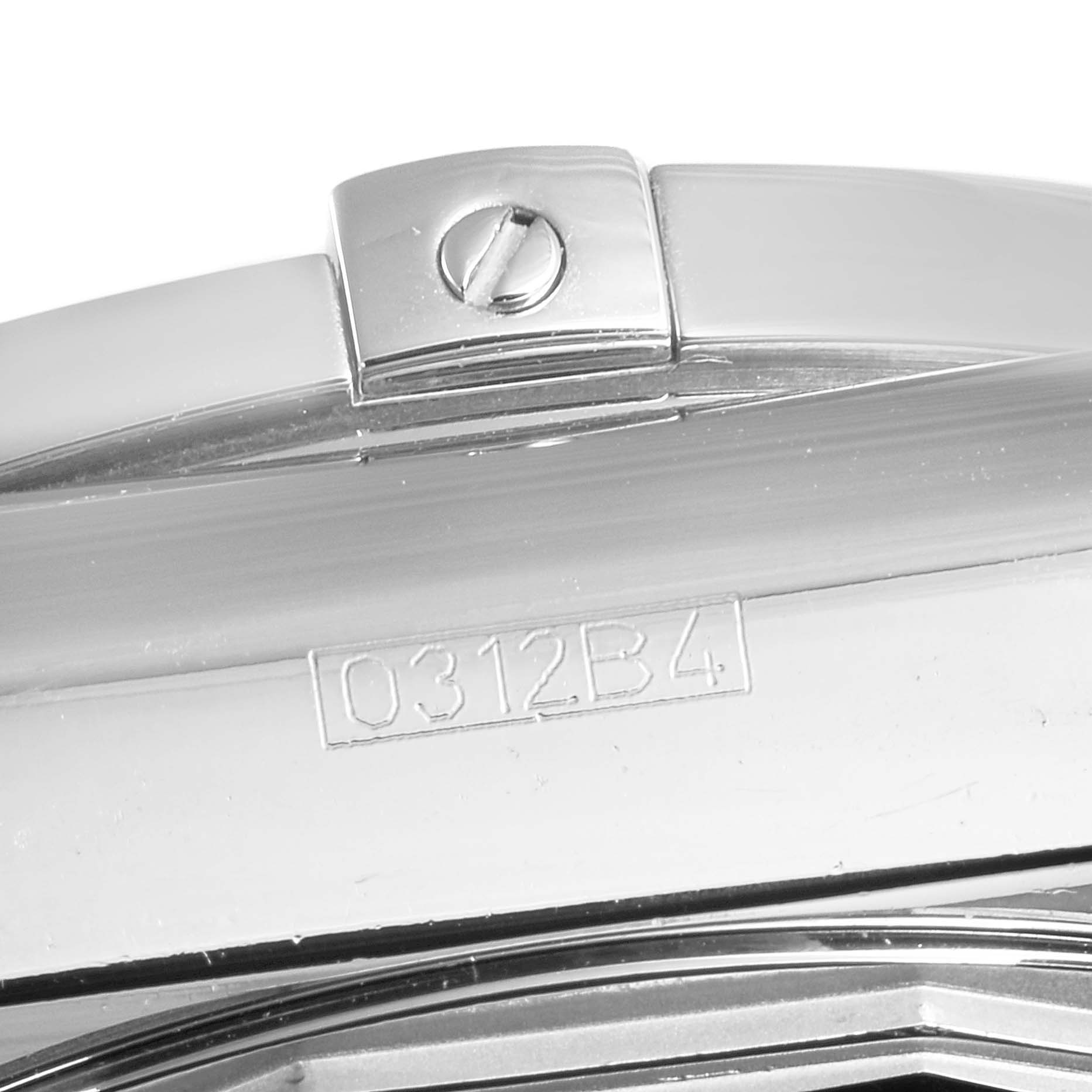 This image shows a close-up of the clasp and a portion with a serial number from a Breitling Chronomat AB0110 Men's Stainless Steel Mother of Pearl Dial AB0110 Men's Stainless Steel Mother of Pearl Dial watch.