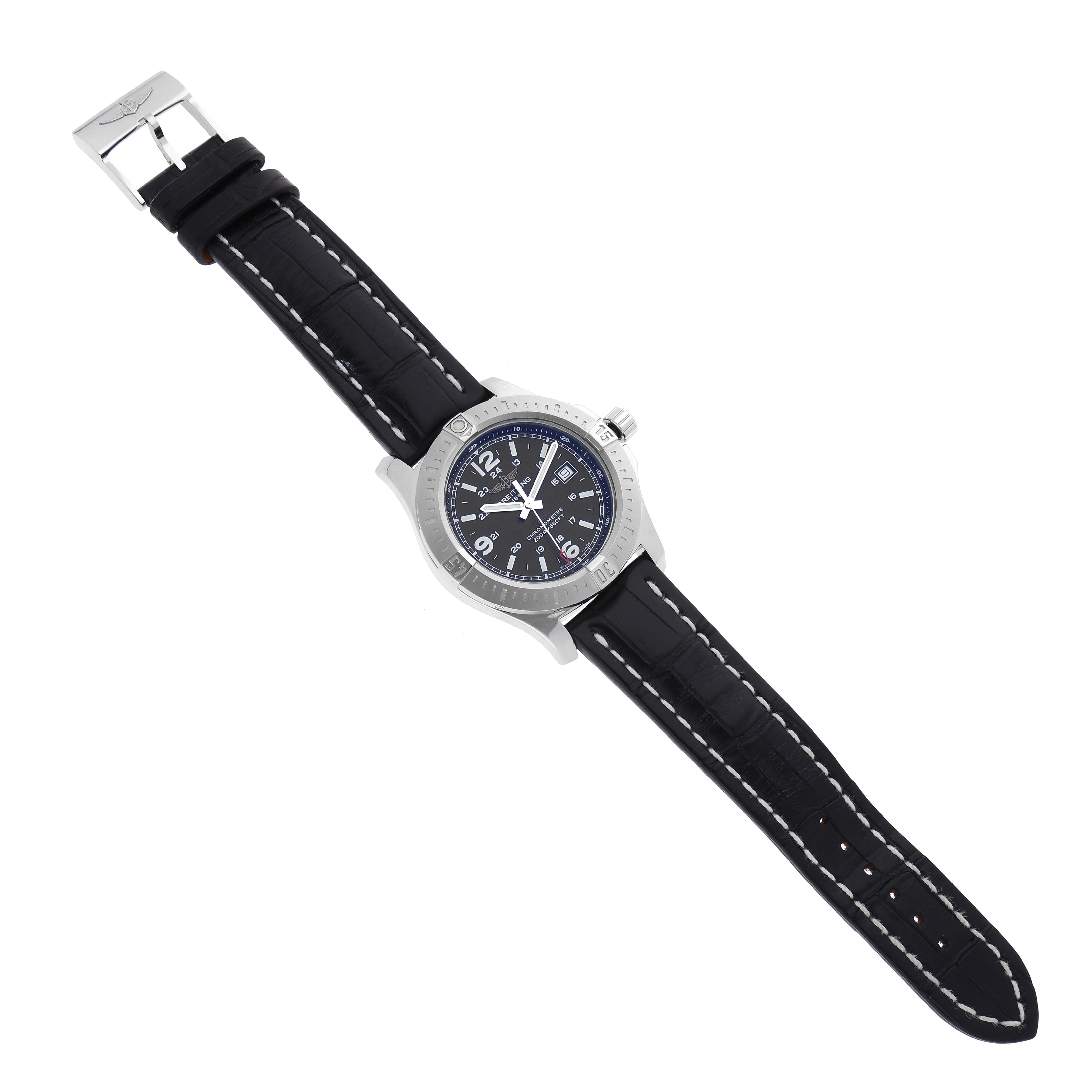 The image shows a Breitling Colt A74388 Men's Stainless Steel Black Dial A74388 Men's Stainless Steel Black Dial watch with a black dial, silver bezel, crown, and a black leather strap with white stitching.