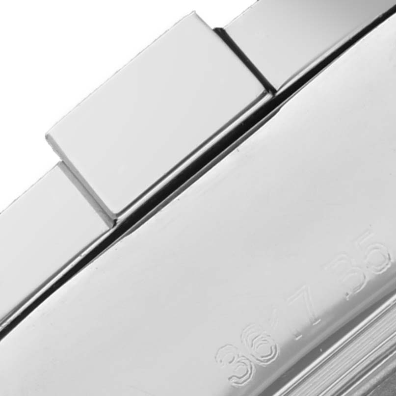 This close-up image of the Breitling Colt A74388 Men's Stainless Steel Black Dial A74388 Men's Stainless Steel Black Dial watch shows a partial view of the metal bracelet links and case back with engraving.