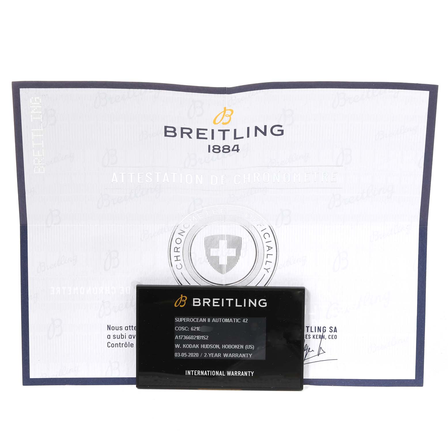 The image shows the documentation and international warranty card for a Breitling Superocean A17366 Men's Stainless Steel Black Dial A17366 Men's Stainless Steel Black Dial model watch.
