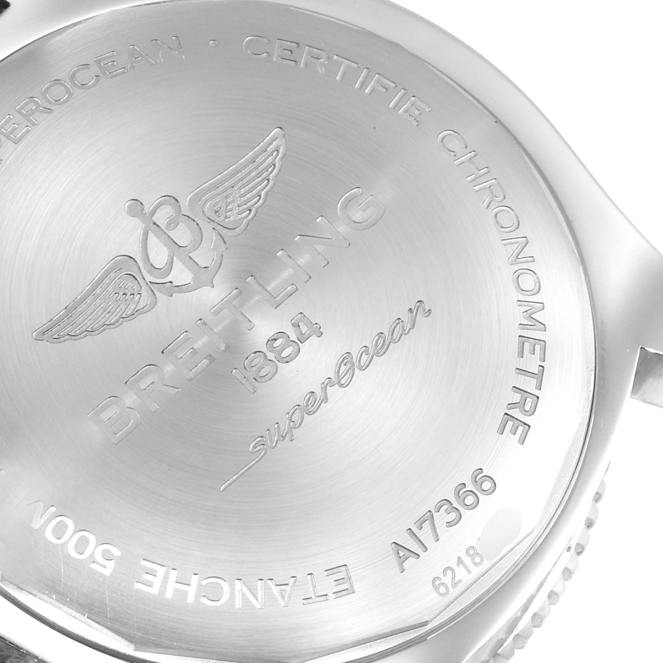 The image shows the back case of a Breitling Superocean A17366 Men's Stainless Steel Black Dial A17366 Men's Stainless Steel Black Dial watch, featuring inscriptions and the Breitling logo.