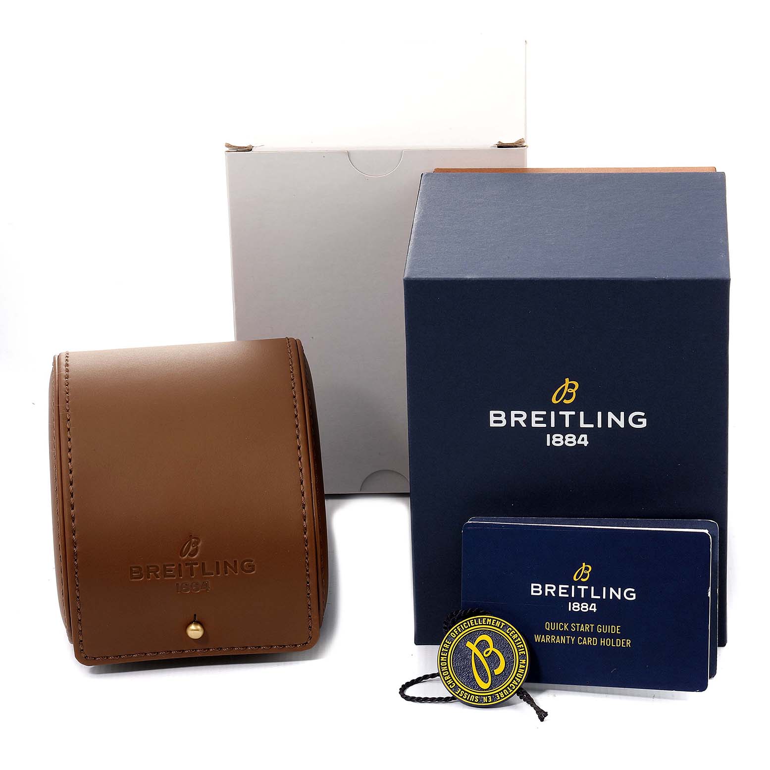 The image shows the packaging and accessories for a Breitling Superocean AB2010161C1A1 Men
s Stainless Steel Black Dial AB2010161C1A1 Men
s Stainless Steel Black Dial watch, including a box, leather pouch, quick start guide, and warranty card holder.