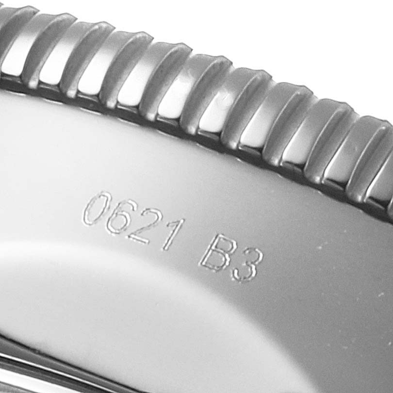 The image shows a close-up of the bezel and part of the casing of a Breitling Superocean AB2010161C1A1 Men
s Stainless Steel Black Dial AB2010161C1A1 Men
s Stainless Steel Black Dial watch with the engravings "0621 B3".