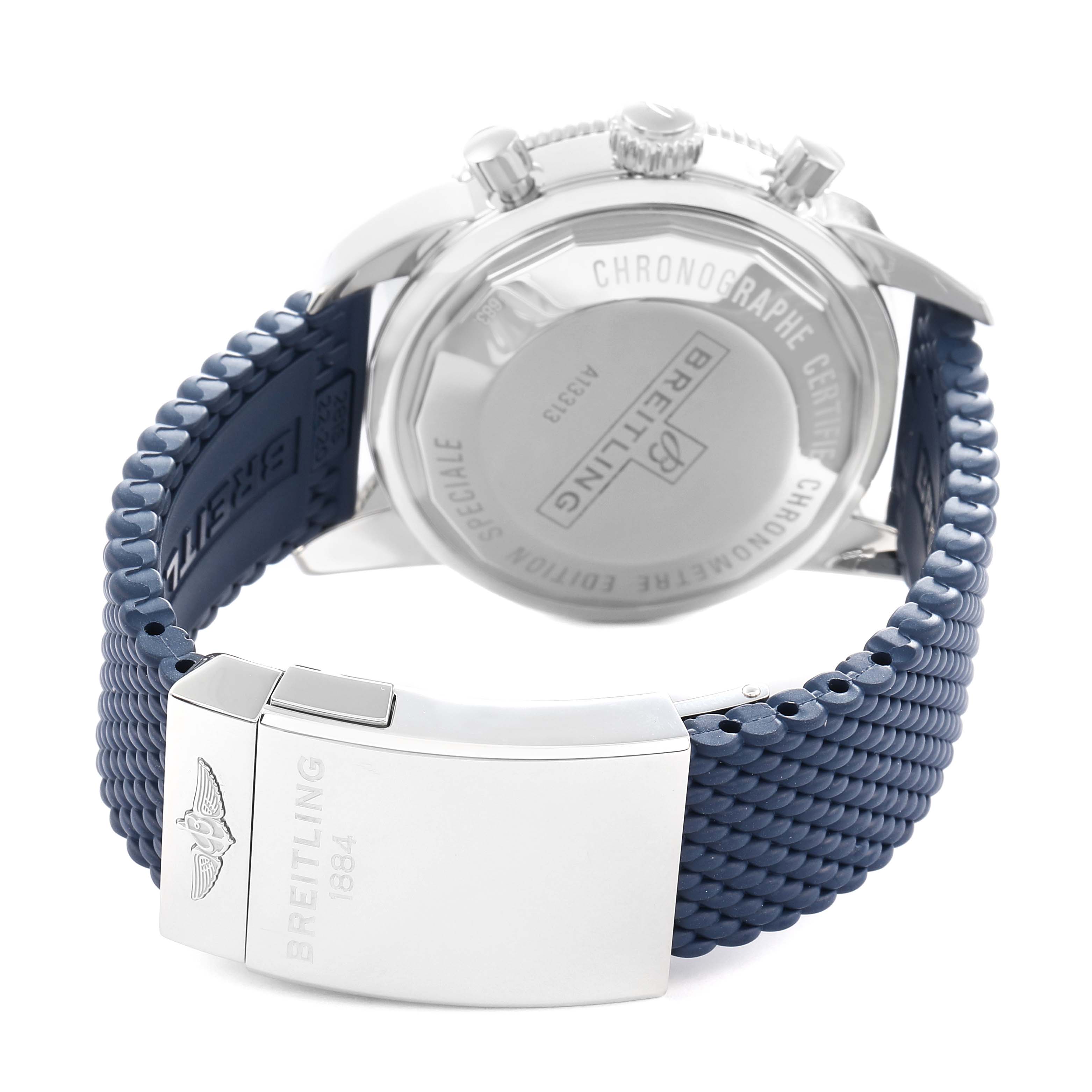 The image shows the back case and clasp of the Breitling Superocean A13313 Men
s Stainless Steel Blue Dial watch, highlighting its engravings and blue strap.