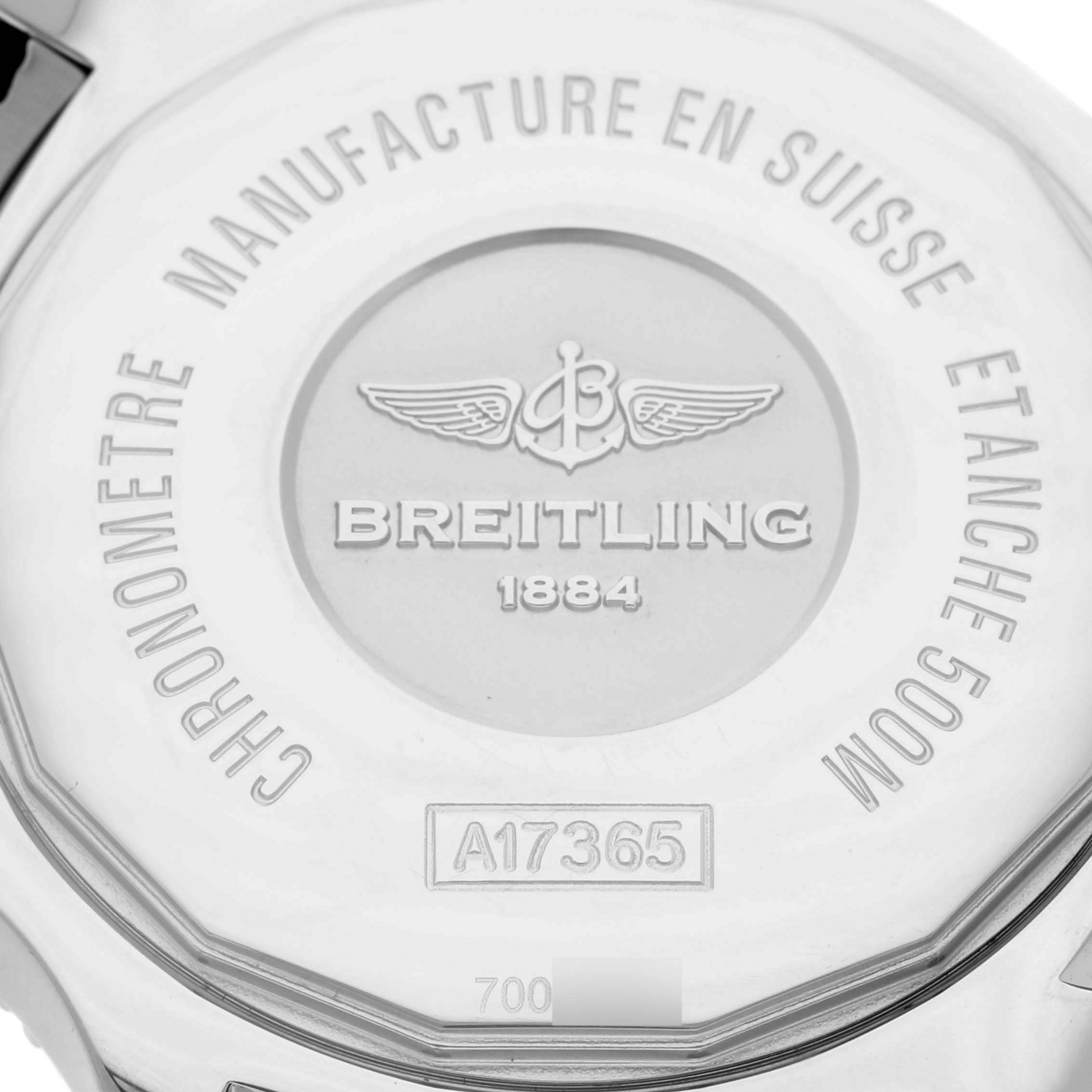 The image shows the back case of a Breitling Superocean A17365 Men
s Stainless Steel Blue Dial A17365 Men
s Stainless Steel Blue Dial watch, including the branding, model number, and text about its manufacture.