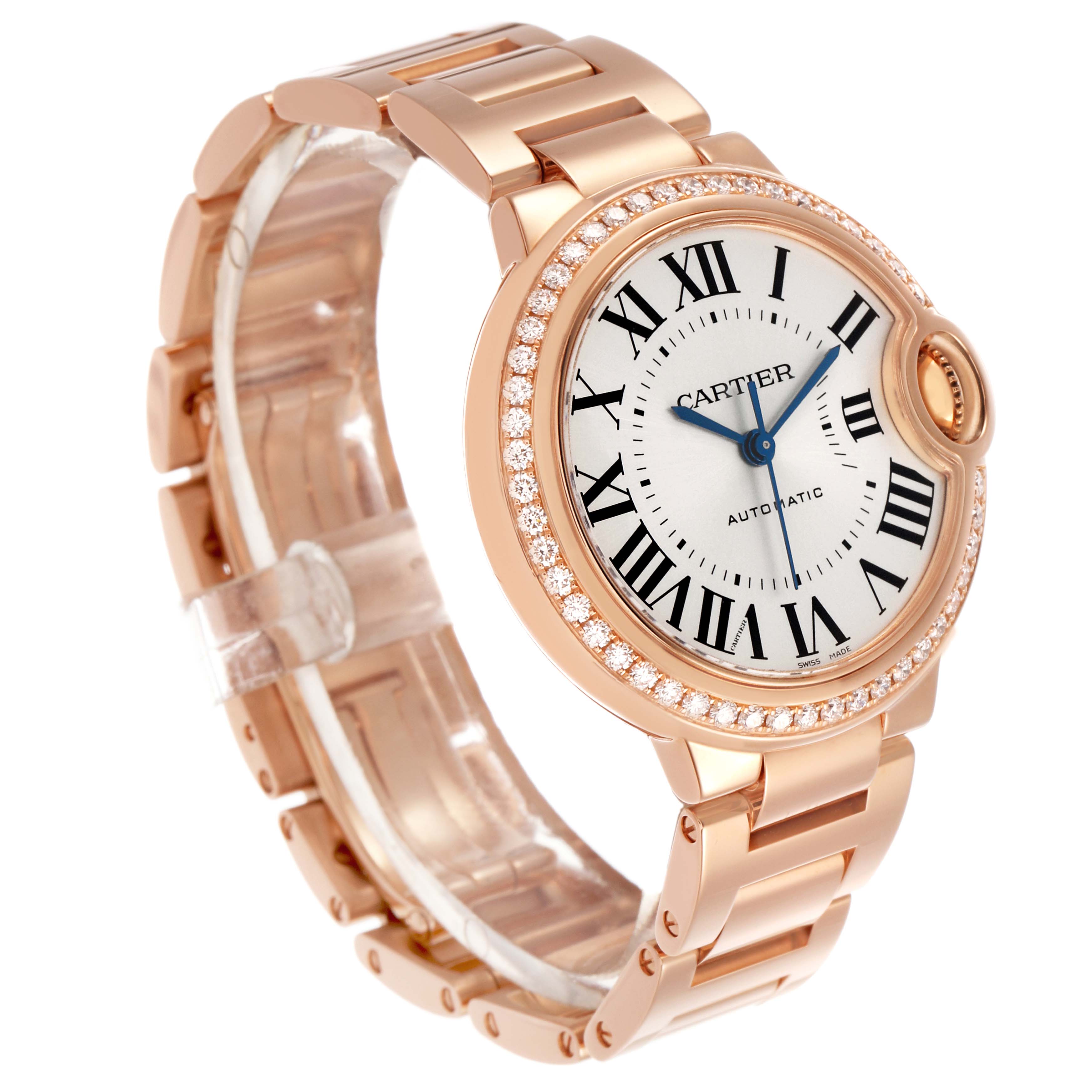 The Cartier Ballon Bleu WJBB0036 Women's Rose Gold Silver Dial watch is shown at an angled view, highlighting its round face, blue hands, Roman numerals, and a diamond-set bezel.